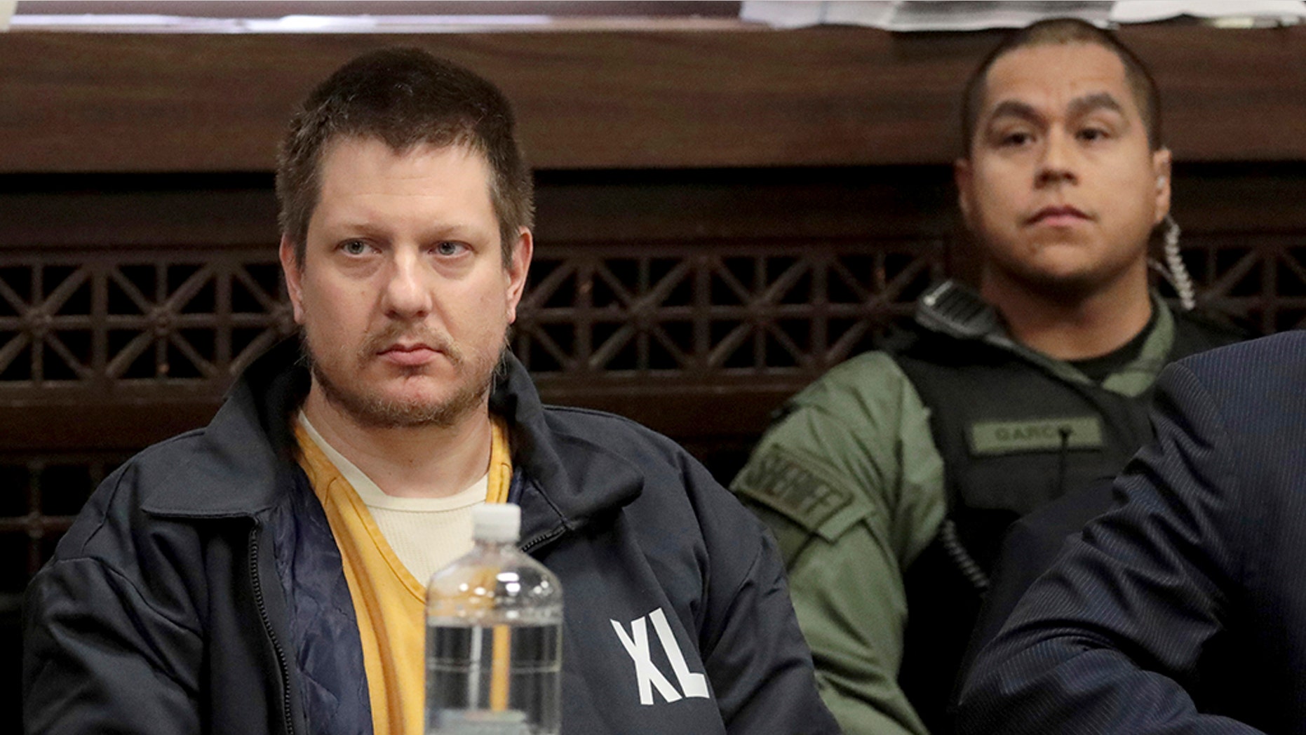 FILE - in this Dec. 14, 2018, file photo, former Chicago police Officer Jason Van Dyke, left, appears for a hearing at the Leighton Criminal Court Building, in Chicago. (Antonio Perez/Chicago Tribune via AP, Pool, File)