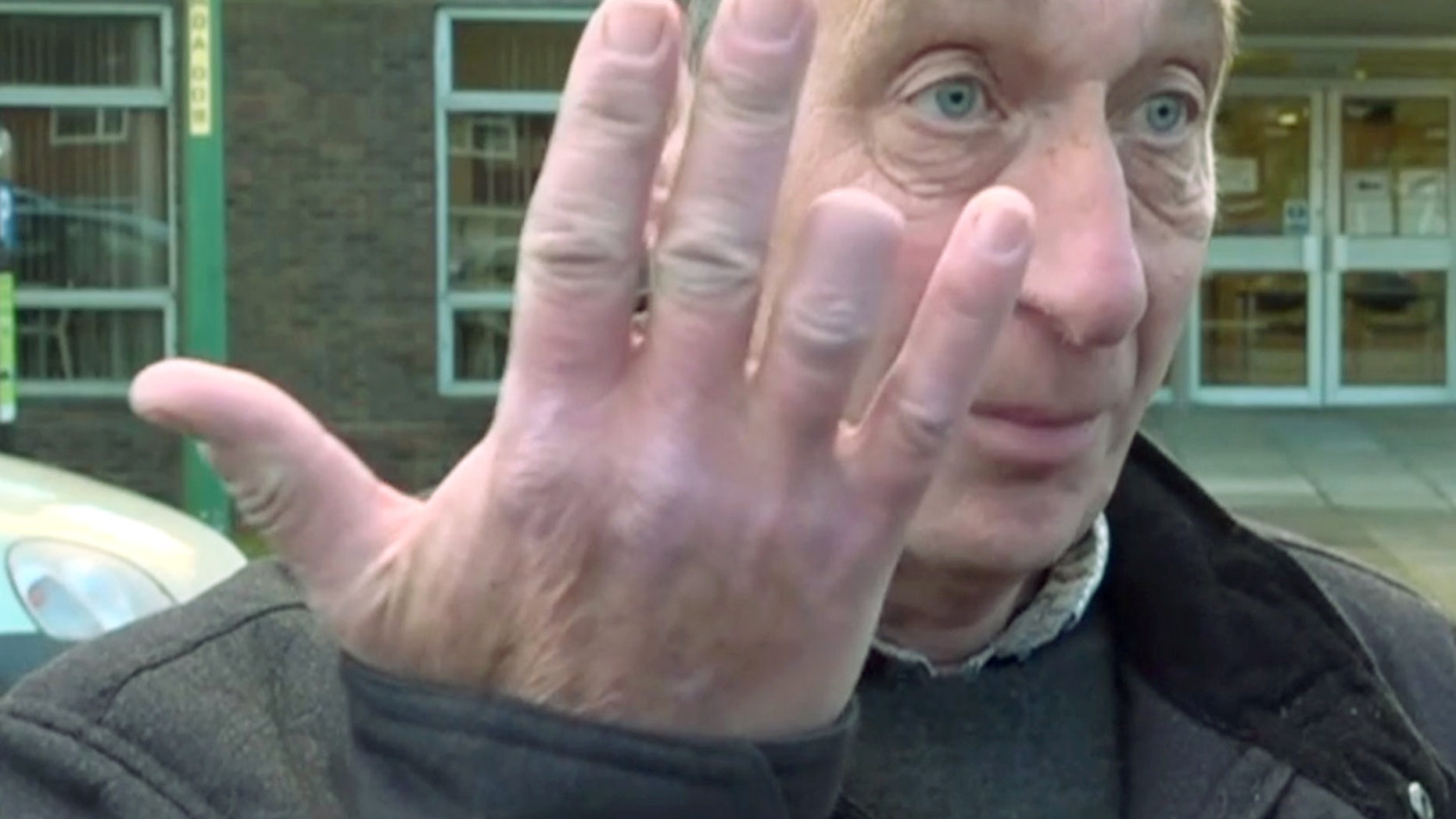 A woman tried claiming the postman who had his finger bitten off by her dog as he pushed post through the letterbox had it coming because he was "trespassing."