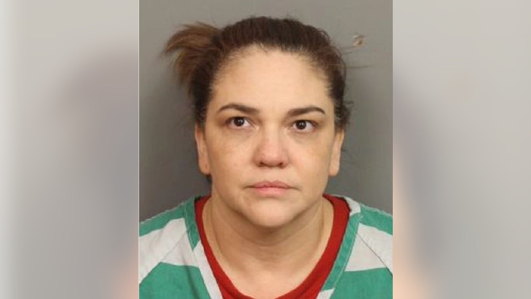 Corina D'Andrea, 49, allegedly attacked her daughter with a machete over money on Monday in Alabama.