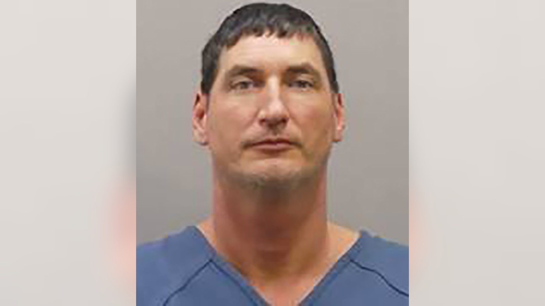 Paul Hicks, 43, turned himself in to authorities in Ohio on Wednesday for allegedly masterminding an 'elaborate' arson scheme intended to frame his ex-girlfriend, police said.