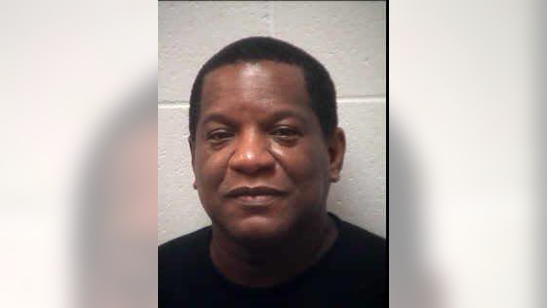 R. Kelly's former manager Henry James Mason has been charged with making terroristic threats.