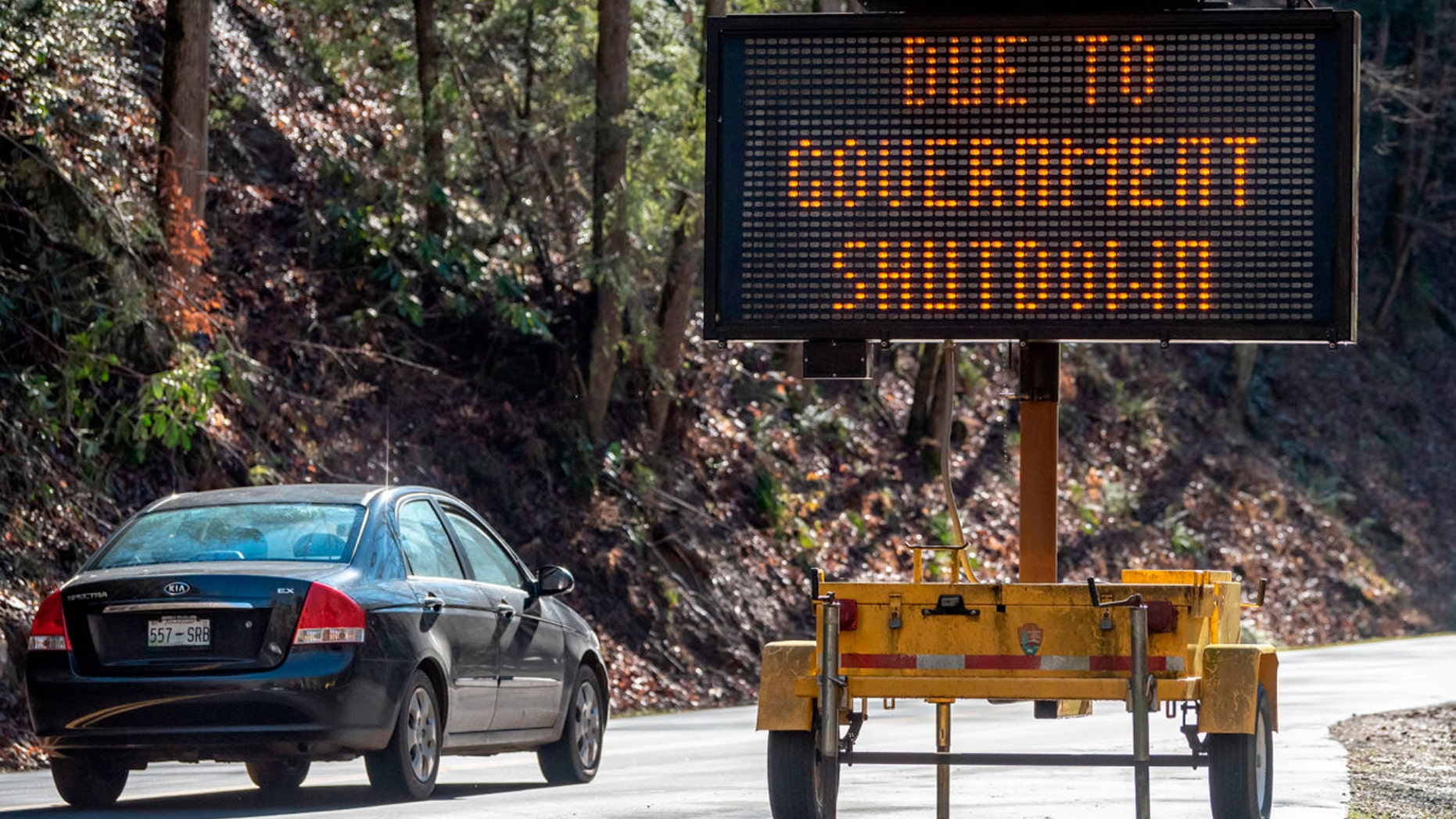 In this Saturday, Jan. 5, 2019, photo visitors to Great Smoky Mountain National Park drive through the park but facilities like the Sugarlands and Cades Cove visitor centers in Townsend, Tenn.