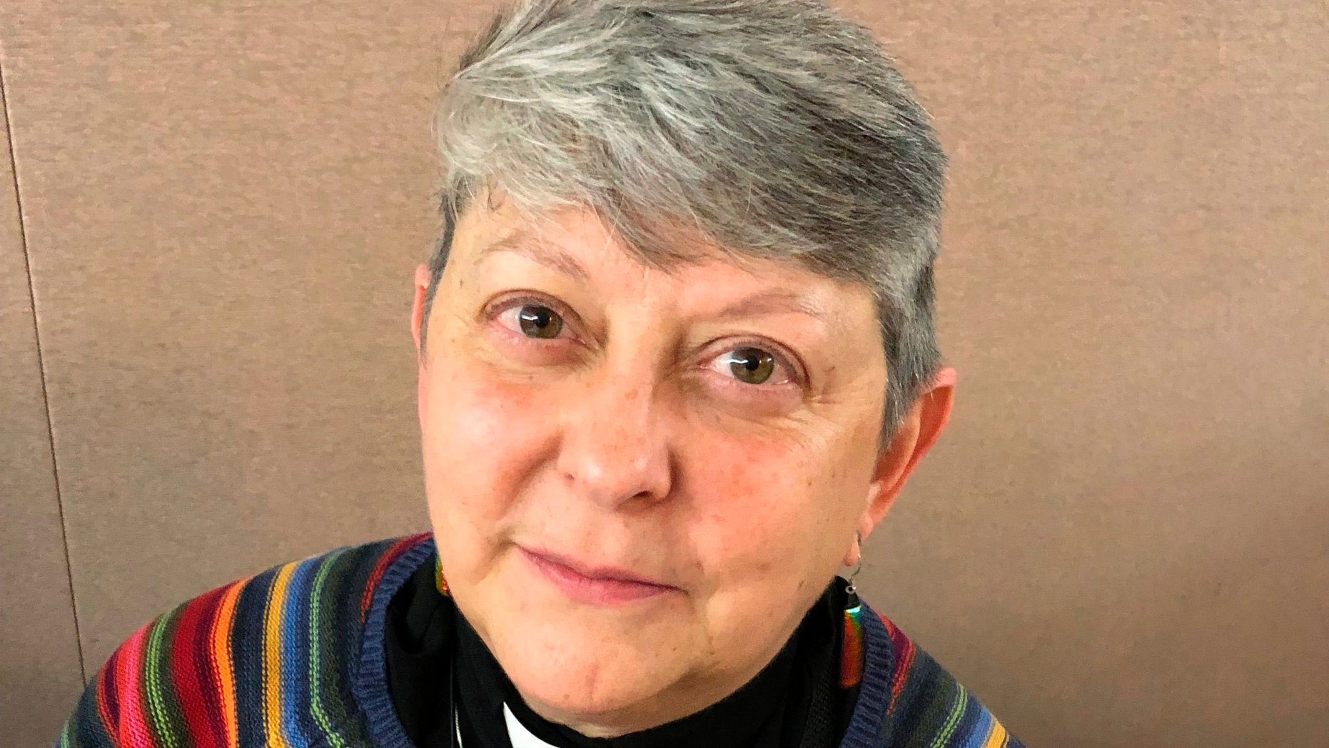 Lois McCullen Parr, 60, a United Methodist elder of Albion, Mich., poses for a picture at a national Methodist conference Monday, Feb. 25, 2019, in St. Louis. Nearly 900 delegates will decide whether America's second-largest Protestant denomination will fracture due to divisions over same-sex marriage and the ordination of LGBT clergy. Parr identifies as bisexual and queer and said no one should be left out of God's love. (AP Photo/Jim Salter)