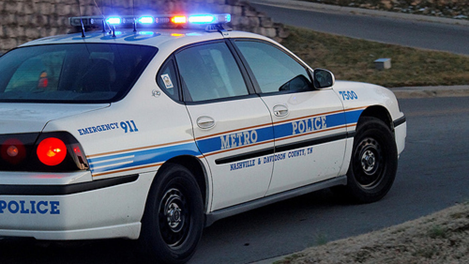 Nashville police arrested three people Wednesday morning after an AK-47 was fired outside a bar.
