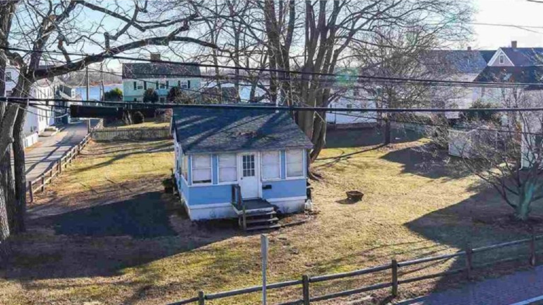 A tiny New Hampshire cottage sitting on less than half an acre of land is on the market for $2 million.