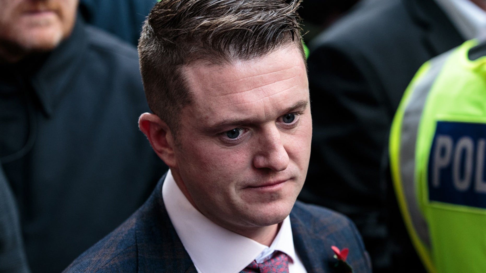 Far-right figurehead Tommy Robinson, real name Stephen Yaxley-Lennon, leaves the Old Bailey on October 23, 2018, in London.