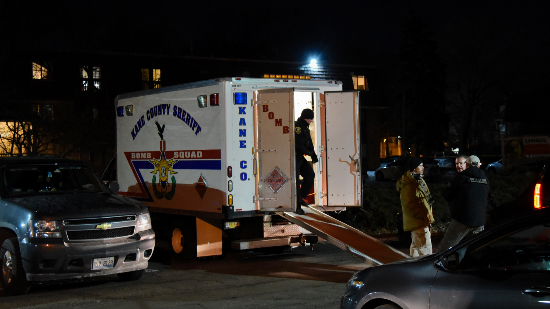 Investigators work at the apartment complex of the alleged shooter from the Henry Pratt Co. on Friday, Feb. 15, 2019, in Aurora, Ill. An employee of a manufacturing company opened fire in its suburban Chicago plant Friday, killing several people and wounding several police officers before he was fatally shot, police said. (AP Photo/Matt Marton)
