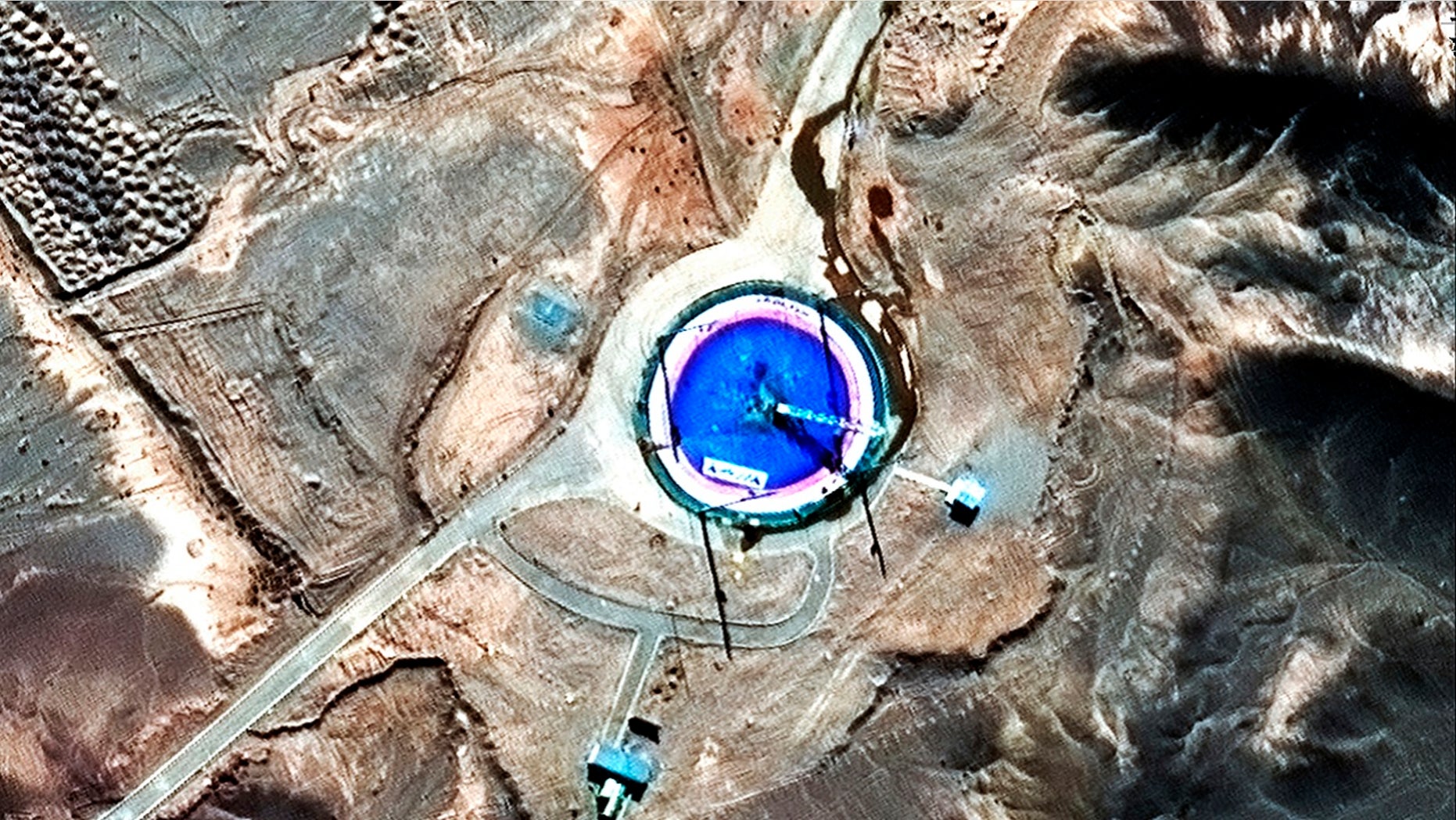 Satellite image provided by DigitalGlobe shows an empty launch pad and a burn mark on it at the Imam Khomeini Space Center in Iran's Semnan province, Feb. 6, 2019. Iran appears to have attempted a second satellite launch despite U.S. criticism that its space program helps it develop ballistic missiles, satellite images released Thursday suggest. Iran has not acknowledged conducting such a launch.