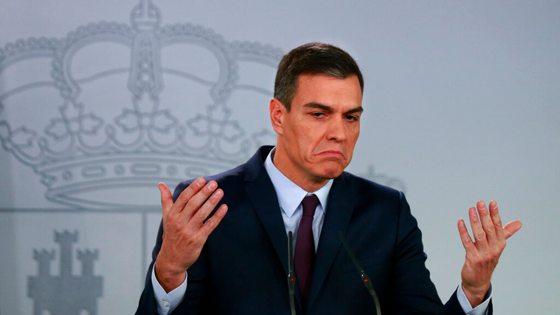 Spain's Prime Minister Pedro Sanchez delivers a statement at the Moncloa Palace in Madrid, Spain, Friday, Feb. 15, 2019. Sanchez has called early general elections for late April, the third such ballot in less than four years.
