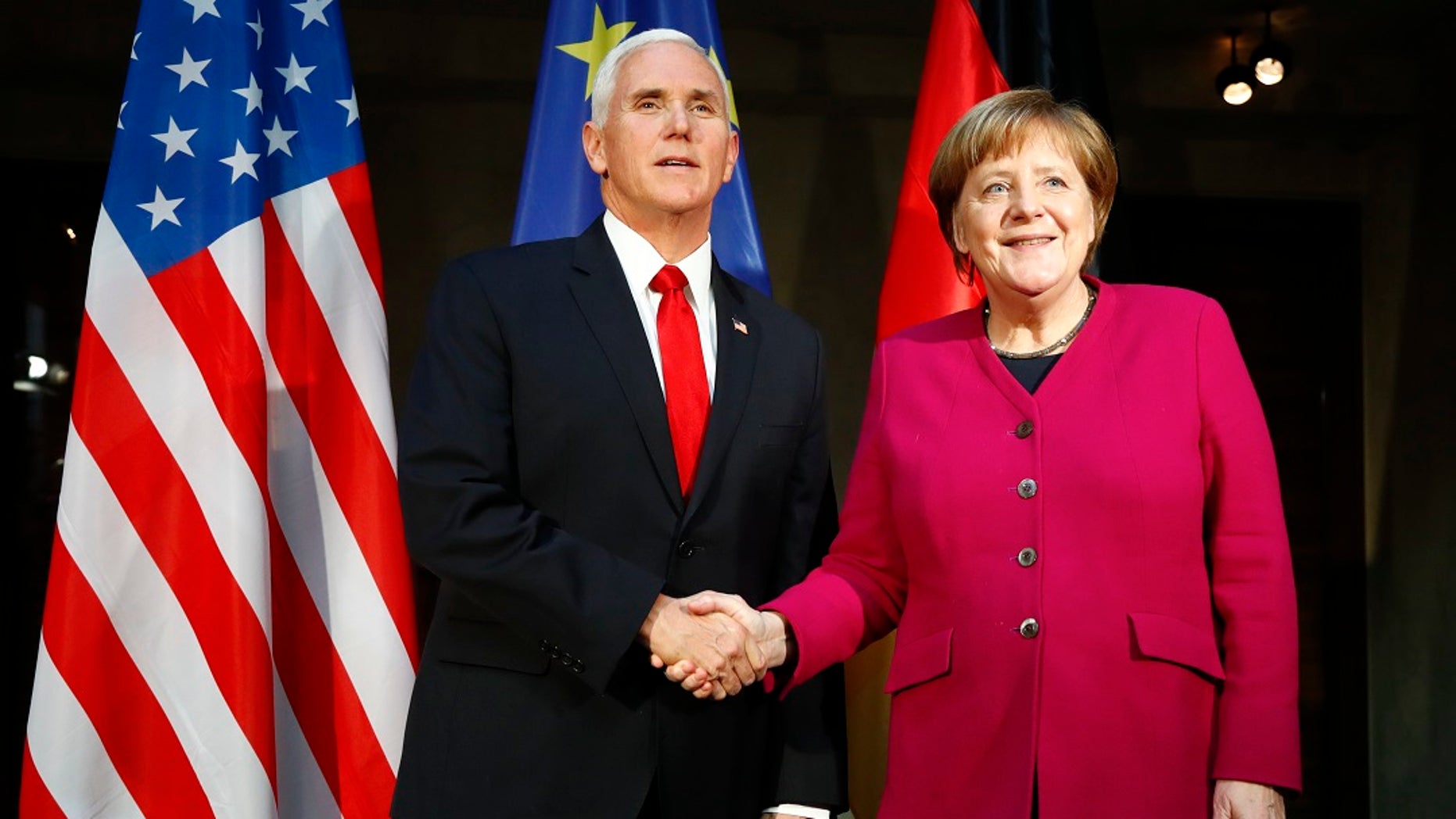 Vice President Mike Pence and German Chancellor Angela Merkel meet at the Munich Security Conference in Munich, Germany, Feb. 16, 2019. (Associated Press)