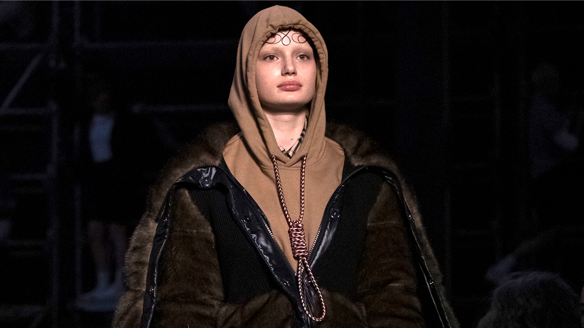 A model wears a creation from Burberry's "Tempest" collection at their autumn-winter runway show during London Fashion Week on Sunday.