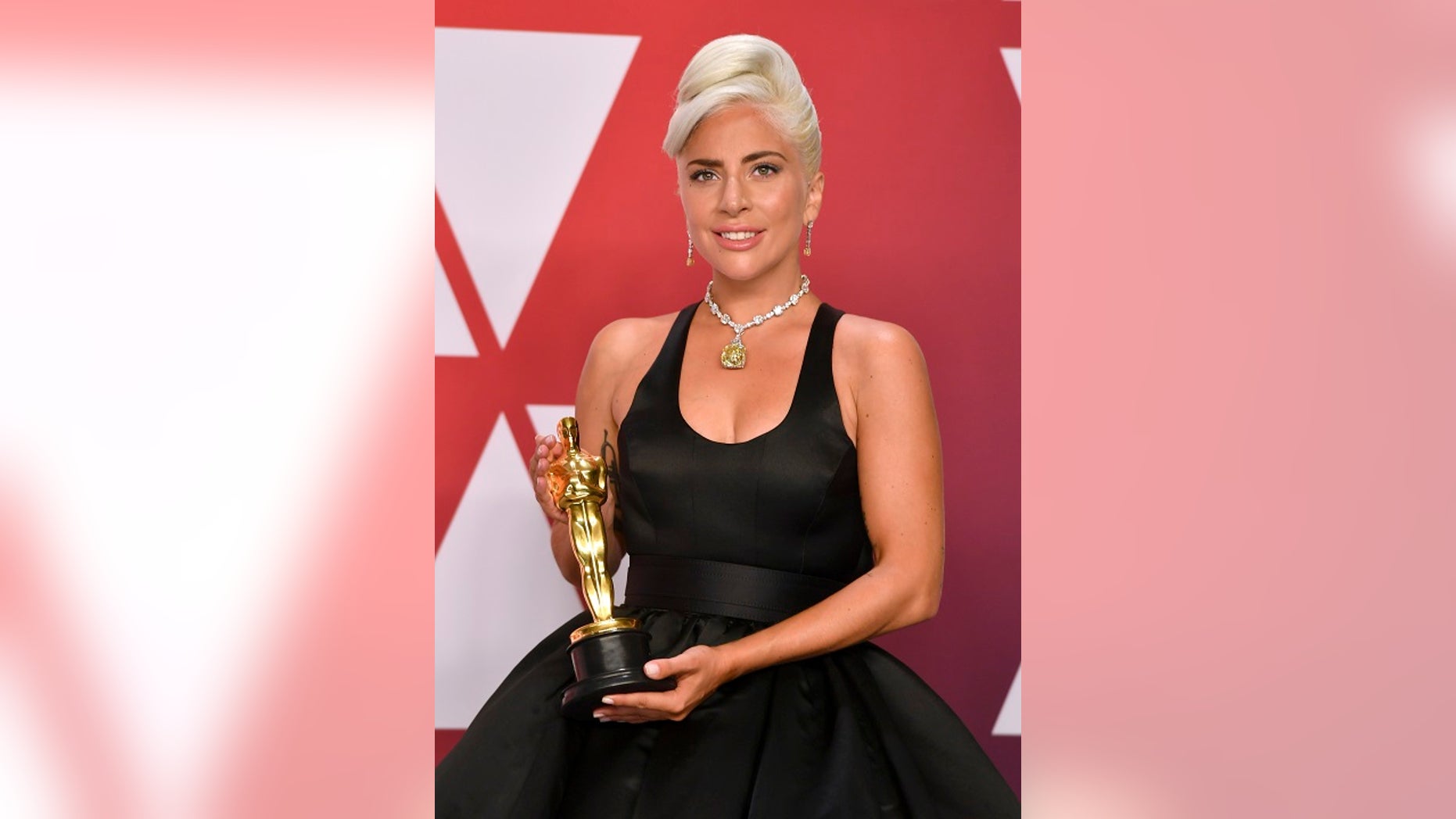 Lady Gaga, winner of the award for best original song for "Shallow" from "A Star Is Born", poses in the press room at the Oscars on Sunday, Feb. 24, 2019, at the Dolby Theatre in Los Angeles. (Photo by Jordan Strauss/Invision/AP)