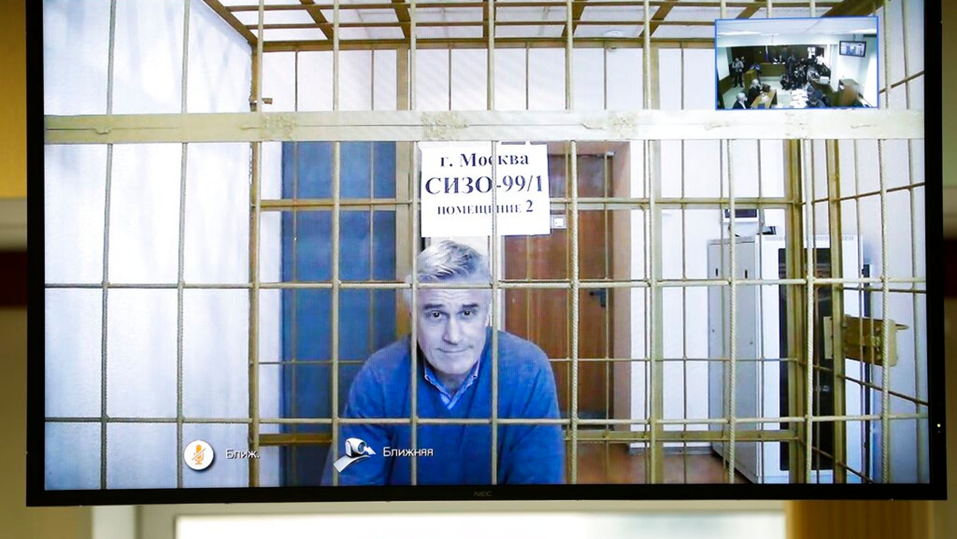 Michael Calvey is seen on a screen during a court session in a courtroom in Moscow, Russia, Thursday, Feb. 28. A Moscow court on Thursday, rejected an appeal by one of Russia's best-known foreign investment managers, ordering to keep Calvey in jail for at least the next month and a half.