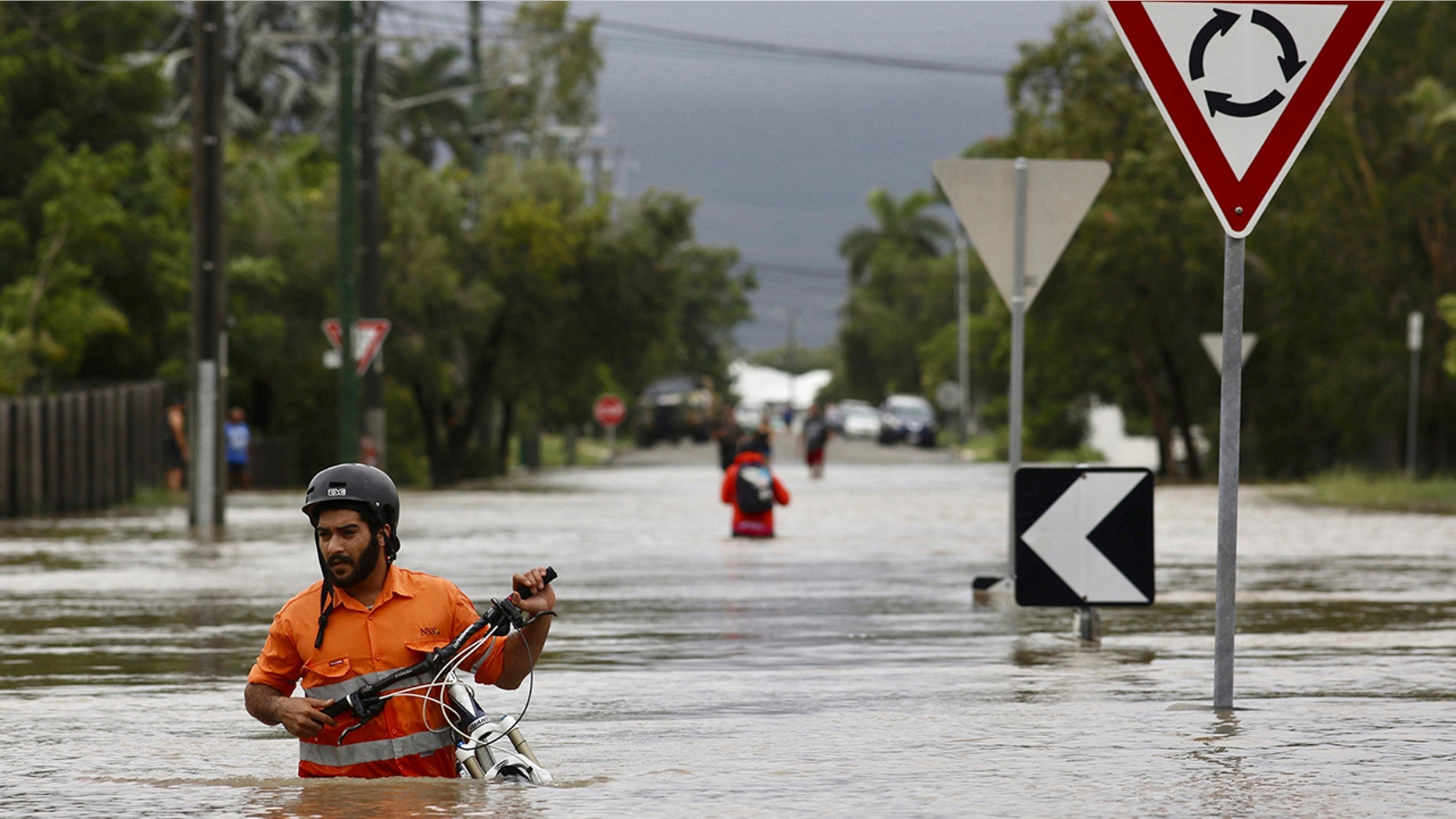 Emergency workers are using boats and helicopters to rescue people from flooded parts of northern Australia where forecasts call for more heavy rainfall.