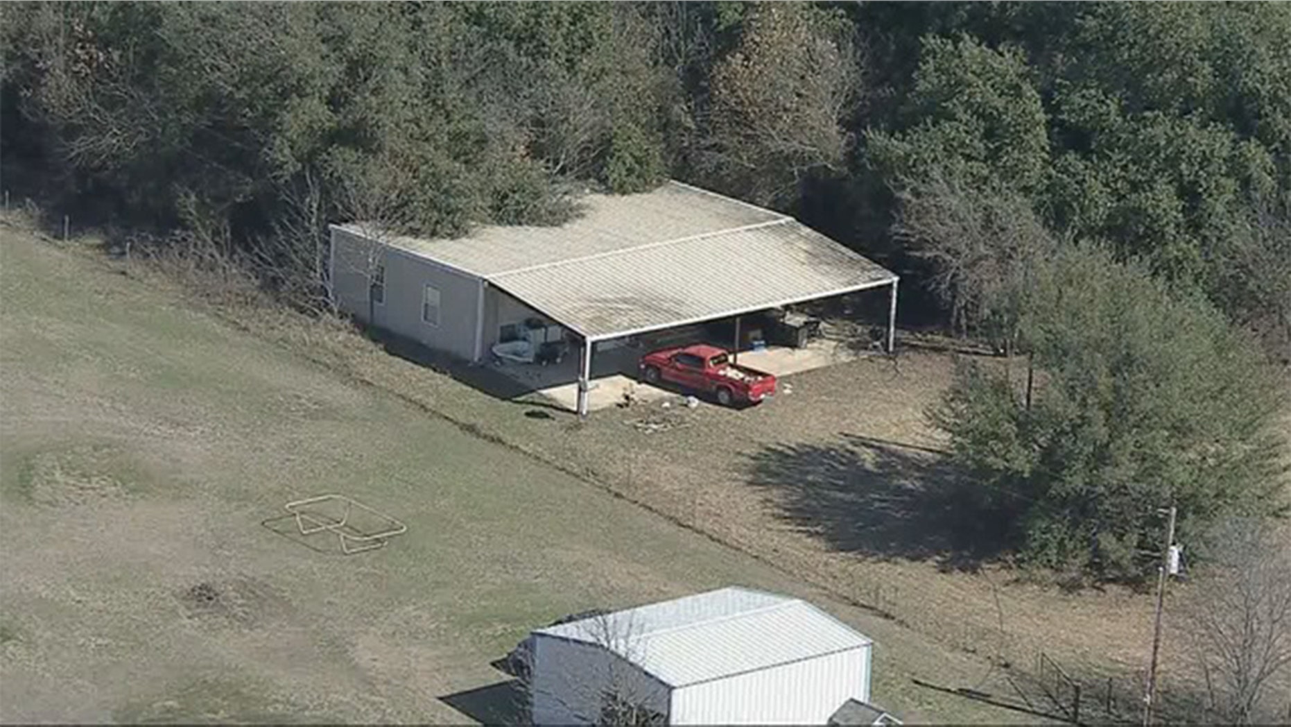 Four underfed children – ages five and younger – were located by authorities on a Texas property on Tuesday, the two eldest of which were inside a locked dog cage, the sheriff said.
