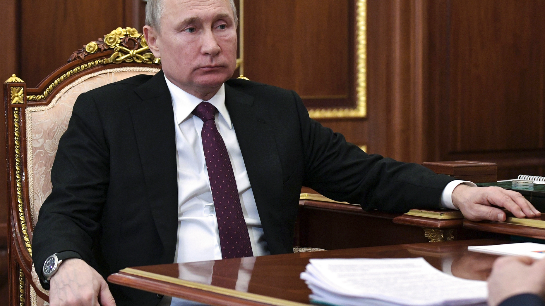 Russian President Vladimir Putin listens to Russian Sport minister Pavel Kolobkov during their meeting in the Kremlin in Moscow, Russia, Monday, Feb. 11, 2019. (Alexei Nikolsky, Sputnik, Kremlin Pool Photo via AP)