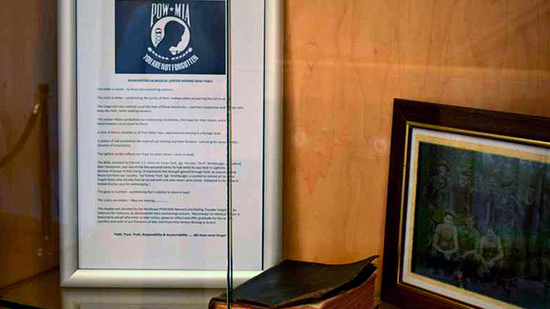 A WWII POW's Bible is displayed at the Manchester VA Medical Center in Manchester, N.H. An outside group tried to get the donated Bible removed because it is "intolerable" and "unconstitutional," but the POW-MIA network says it's a symbol of hope. (Office of Public Affairs, Manchester VA Medical Center via AP)
