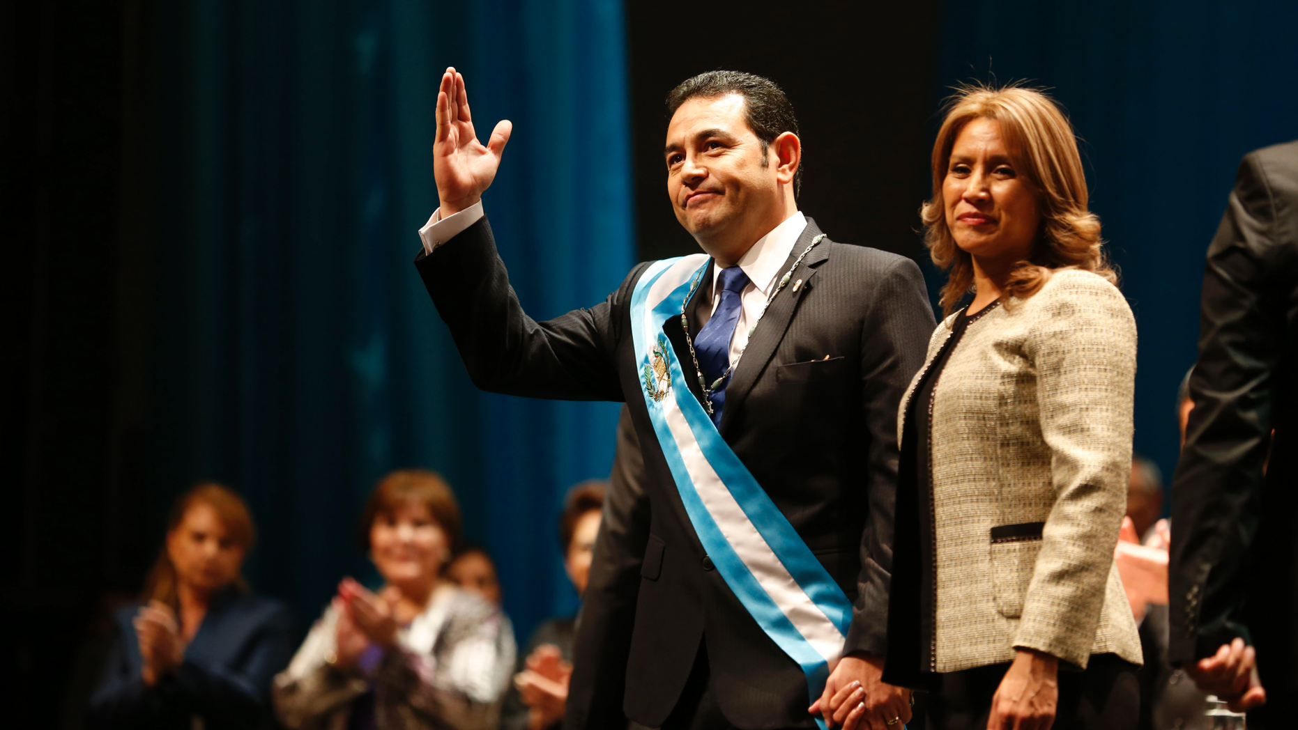 FILE - In this Jan. 14, 2016 file photo, first lady Hilda Patricia Marroquin de Morales accompanies her husband Guatemalan President Jimmy Morales, at the National Theater in Guatemala City. Guatemala’s chief prosecutor announced on Friday, Feb. 22, 2019 that her office has initiated an investigation of alleged corruption against the first lady. (AP Photo/Moises Castillo, File)