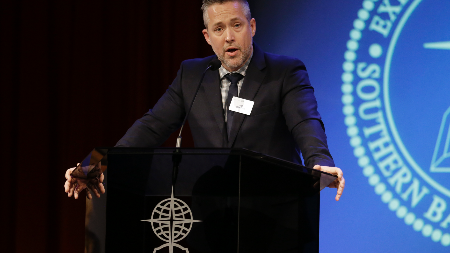 In this Feb. 18, 2019 photo, Southern Baptist Convention President J.D. Greear speaks to the denomination's executive committee in Nashville, Tenn. Southern Baptist officials have cleared seven churches accused of covering up sexual abuse just days after the top leader called for greater scrutiny following a joint newspaper investigation that uncovered rampant sexual misconduct. The Houston Chronicle and the San Antonio Express-News report that a Southern Baptist Convention working group announced only three churches should be at risk of losing membership over their handling of allegations of sexual abuse. (AP Photo/Mark Humphrey)
