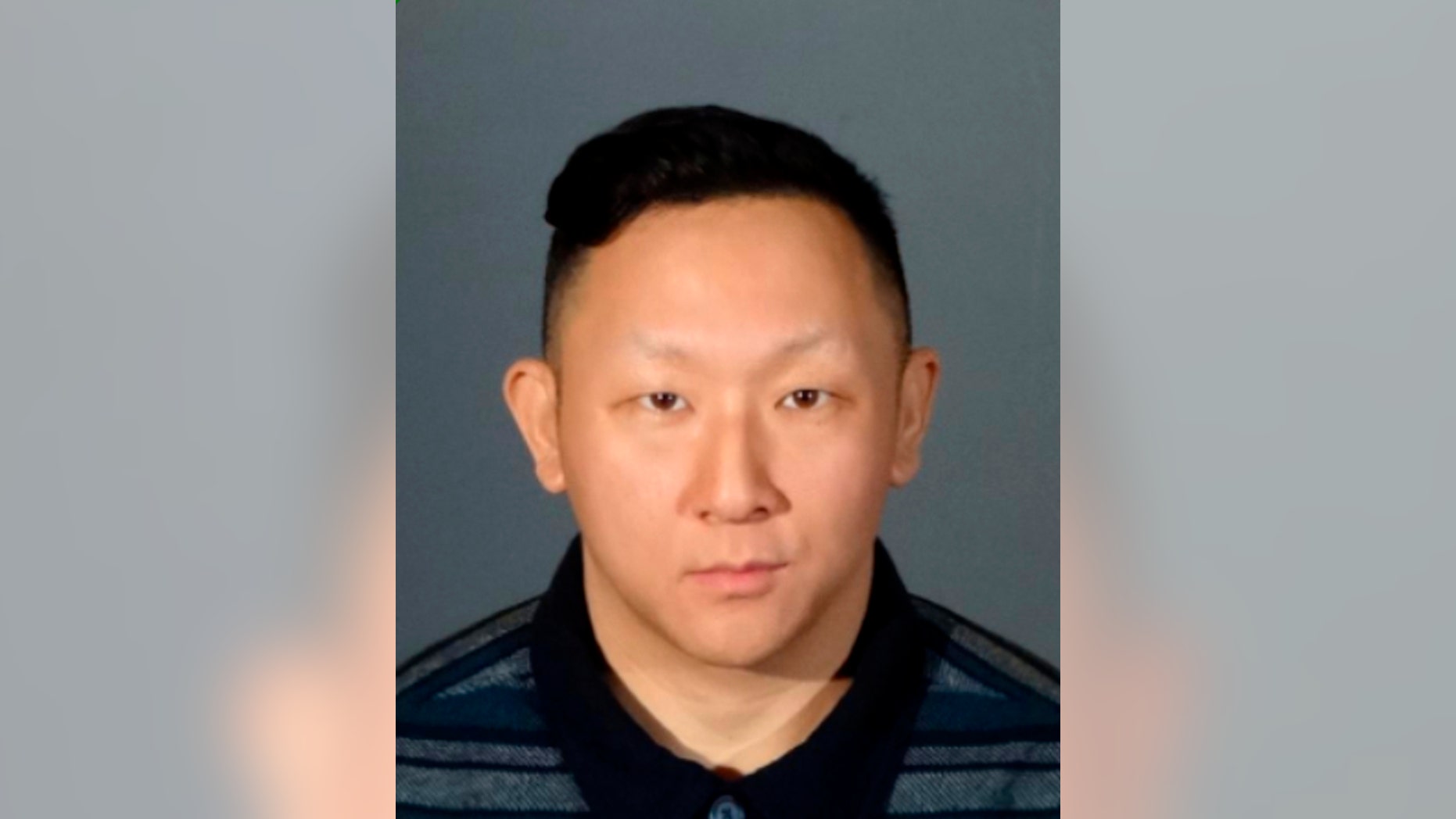 This booking photo released by Los Angeles County Sheriff Department shows Daniel Sohn, who was arrested Friday, Feb 8, 2019, by West Hollywood Sheriff's station deputies in Los Angeles. Sohn, who was recorded antagonizing demonstrators during a Black Lives Matter protest, was arrested on suspicion of impersonating a police officer. (Los Angeles County Sheriff's Department via AP)