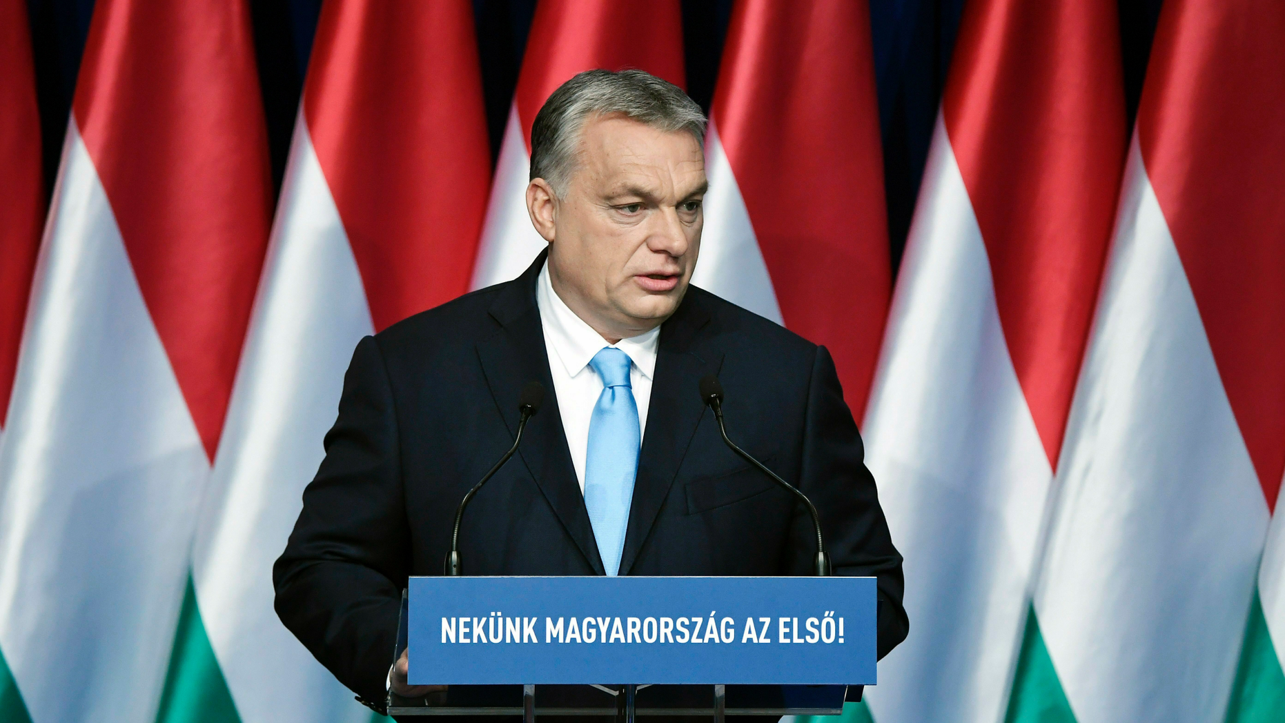 Hungarian Prime Minister Viktor Orban delivers his annual "State of Hungary" speech in Budapest, Hungary, Sunday, Feb. 10, 2019. The inscription reads: "For us Hungary is the first!"