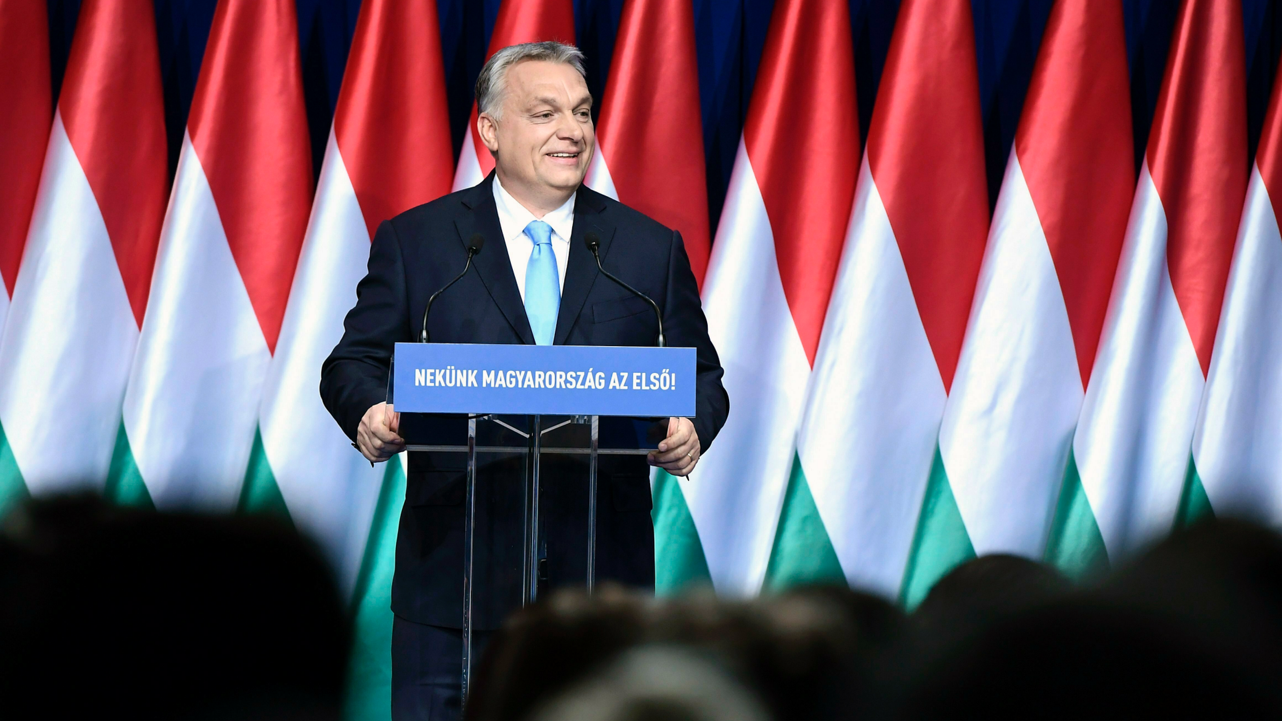 Hungarian Prime Minister Viktor Orban delivers his annual "State of Hungary" speech in Budapest, Hungary, Sunday, Feb. 10, 2019. The inscription reads: "For us Hungary is the first!"