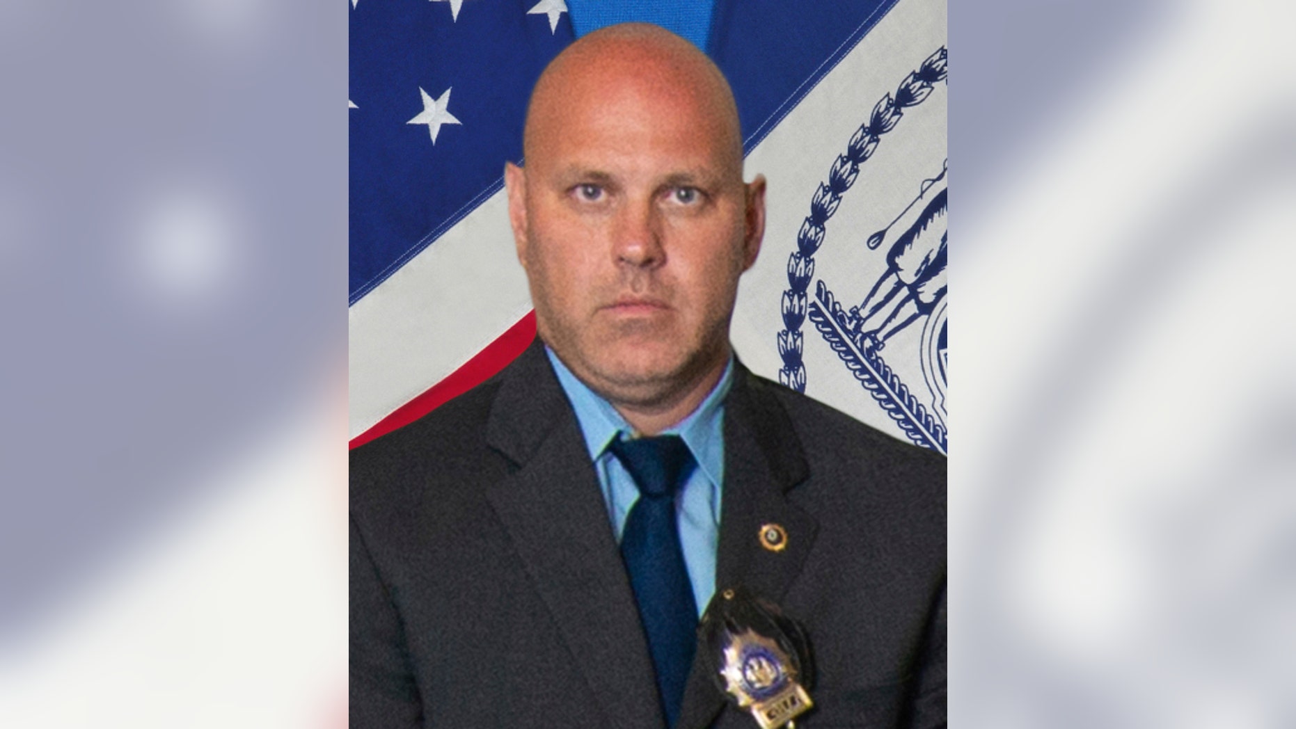 FILE - In this undated photo provided by the New York City Police Department, Det. Brian Simonsen is shown. The New York City police detective killed by friendly fire last week in Queens is being laid to rest. Simonsen's funeral Wednesday, Feb. 20, 2019, at the Roman Catholic Church of St. Rosalie in Hampton Bays is expected to draw thousands of people, including police officers and more than 500 New York City firefighters. (New York City Police Department via AP, File)