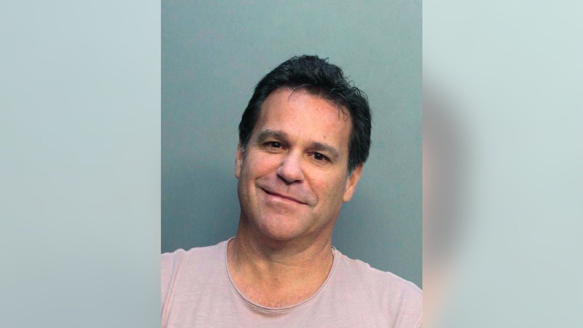 This Jan. 21, 2019 photo provided by the Miami Dade Department of Corrections shows Mark Allen Bartlett. On Tuesday, Feb. 19, 2019, the Miami-Dade County state attorney's office said that Bartlett is charged with three counts of aggravated assault with prejudice and two firearms counts. The hate crime charges stem from an incident when Bartlett got into a traffic confrontation with a group of black teenagers protesting housing inequality. (Miami Dade Dept. of Corrections via AP)