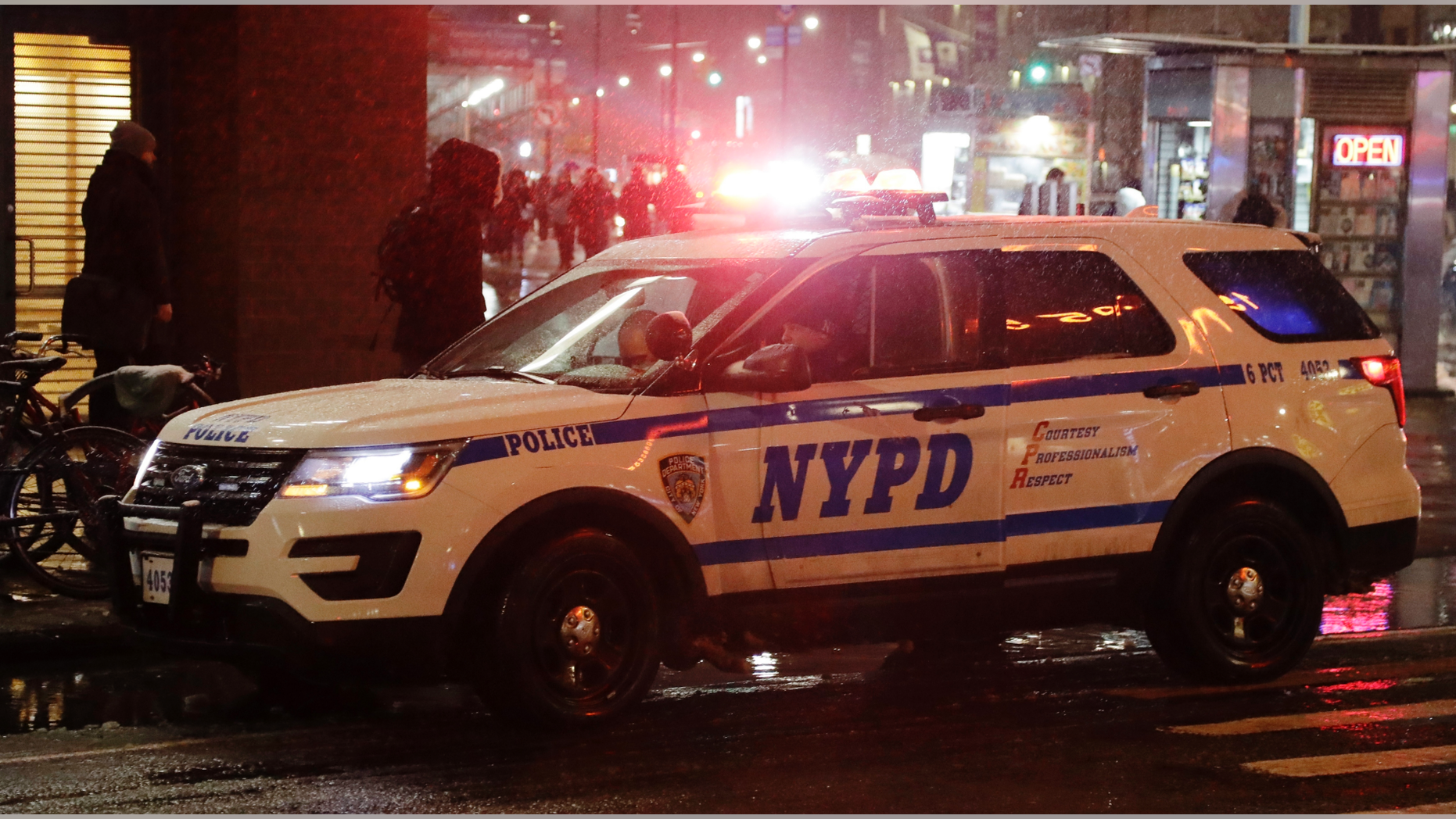 In this Wednesday, Feb. 20, 2019, photo, a police vehicle responds in New York. That long, droning police and ambulance siren that has become part of the soundtrack of New York City for generations could be changing. A pair of city lawmakers has proposed switching to the high-low, European-style wail heard on the streets of London and Paris. (AP Photo/Frank Franklin II)