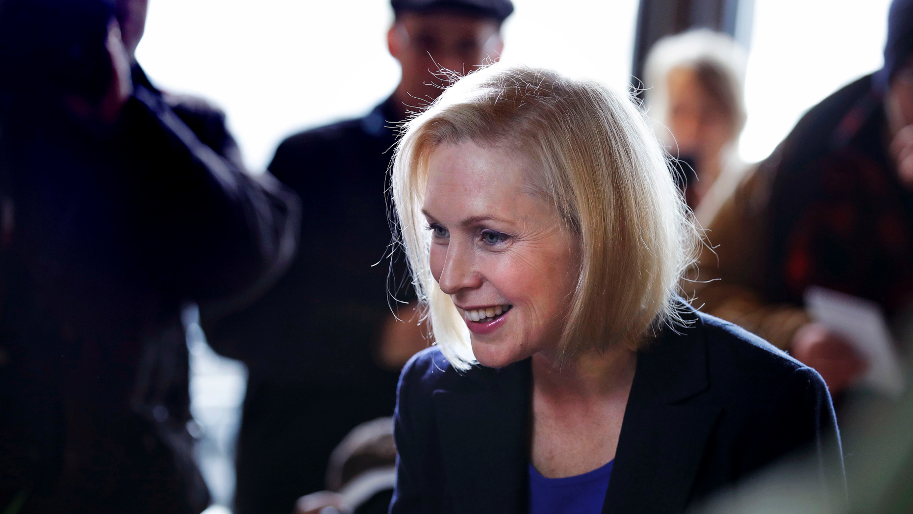 Sen. Kirsten Gillibrand, D-NY, smiles as she listens to a patron while visiting a coffee shop on Main Street in Concord, N.H., Friday, Feb. 15, 2019. Gillibrand visited New Hampshire as she explores a 2020 run for president. (AP Photo/Charles Krupa)