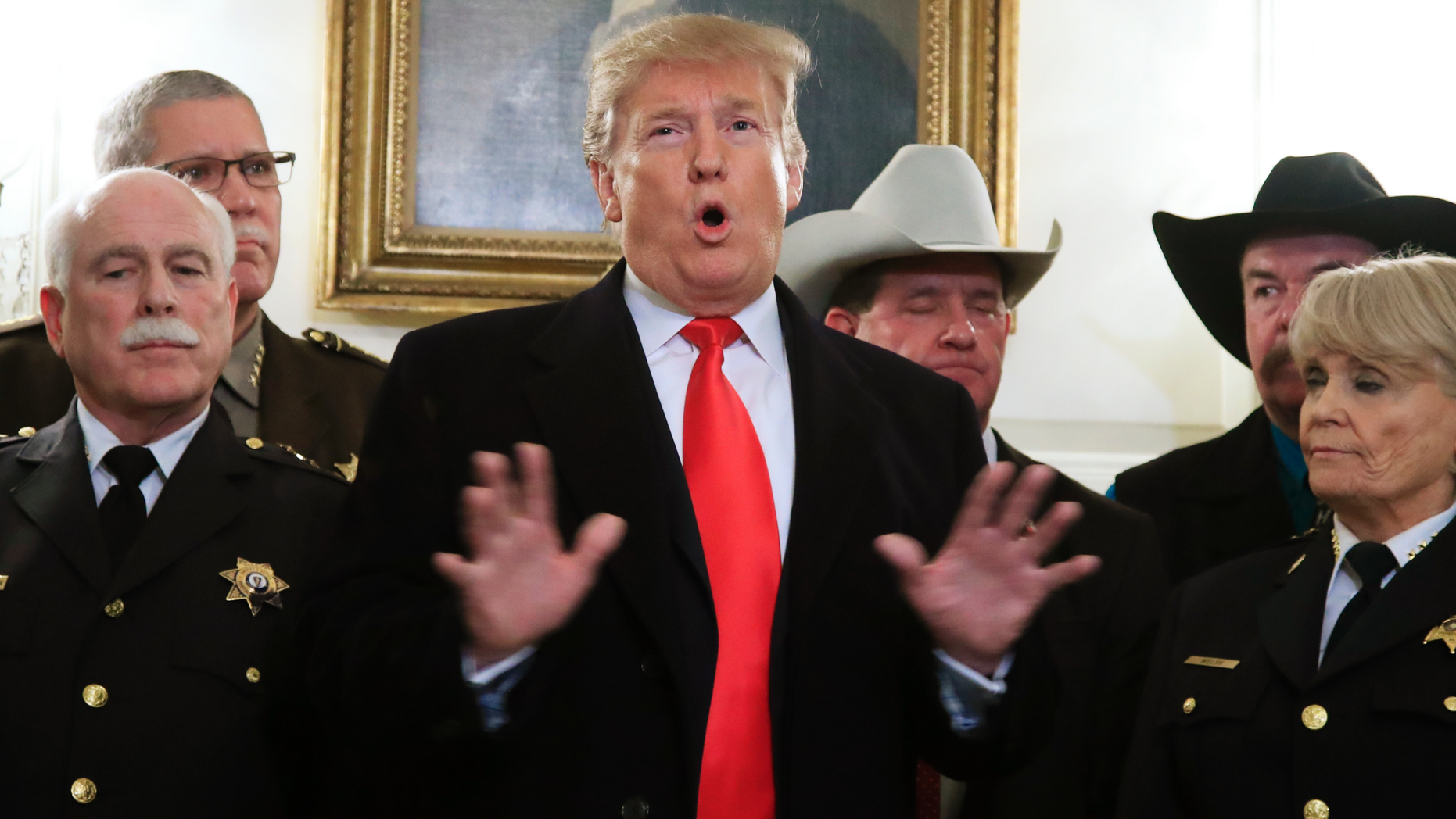 President Donald Trump speaks during a meeting with a group of sheriffs from around the country before leaving the White House in Washington, Monday, Feb. 11, 2019, for a trip to El Paso, Texas. (AP Photo/Manuel Balce Ceneta)