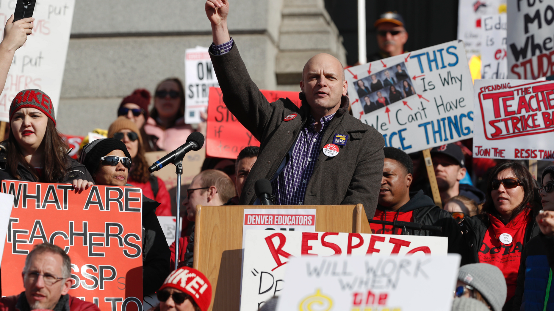 Ron Ruggiero, president of the Service Employees International Union Local 105, speaks to striking Denver teachers during a strike rally on the west steps of the State Capitol Monday, Feb. 11, 2019, in Denver. The strike is the first for teachers in Denver since 1994 and centers on base pay. (AP Photo/David Zalubowski)