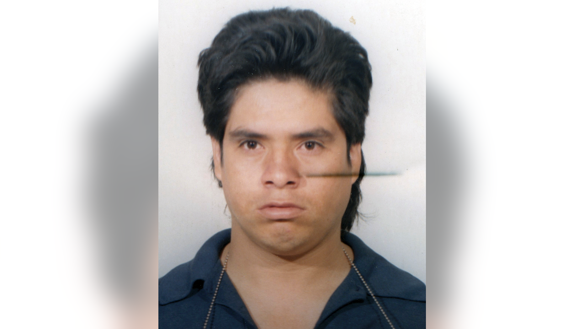 This 1993 booking photograph released Friday, Feb. 15, 2019, by the Norwalk, Conn., Police Department shows Landberto Quintero, whose remains were found April 18, 1996 on Shea Island in Long Island Sound off the Connecticut coast. The police said Quintero was identified through a new search of an updated law enforcement fingerprint database. (Norwalk Police Department via AP)