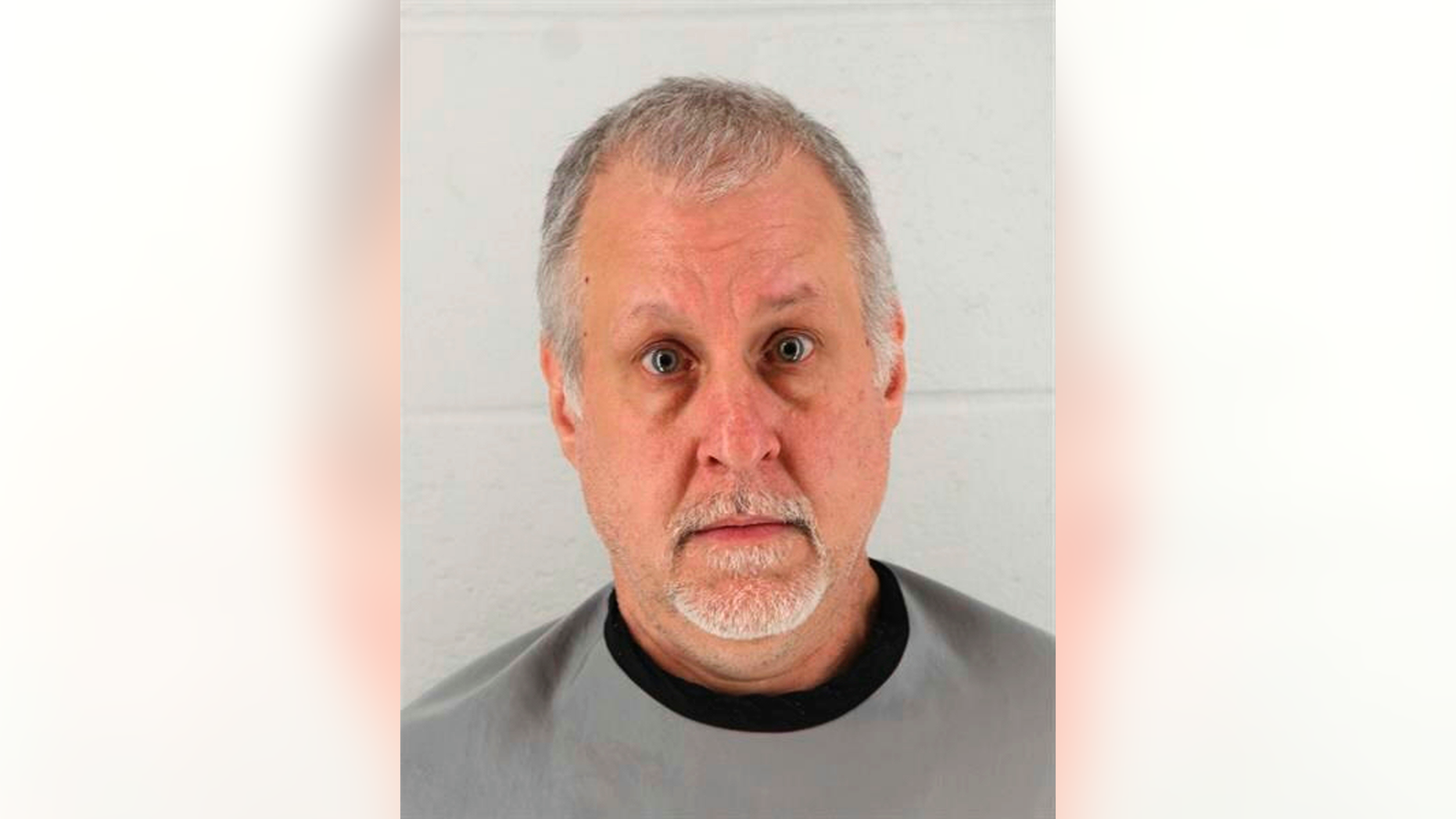 This Jan 24, 2019 booking photo released by Johnson County Sheriff's Office shows Raymond McManness. Court records say the suburban Kansas City man told investigators he didn't seek medical care for his ailing mother before she died weighing just 58 pounds and suffering from open bed sores. The Kansas City Star reports that the records were released Wednesday, Feb. 20, 2019, in the case against 51-year-old McManness, of Olathe, Kan. (Johnson County Sheriff's Office via AP)