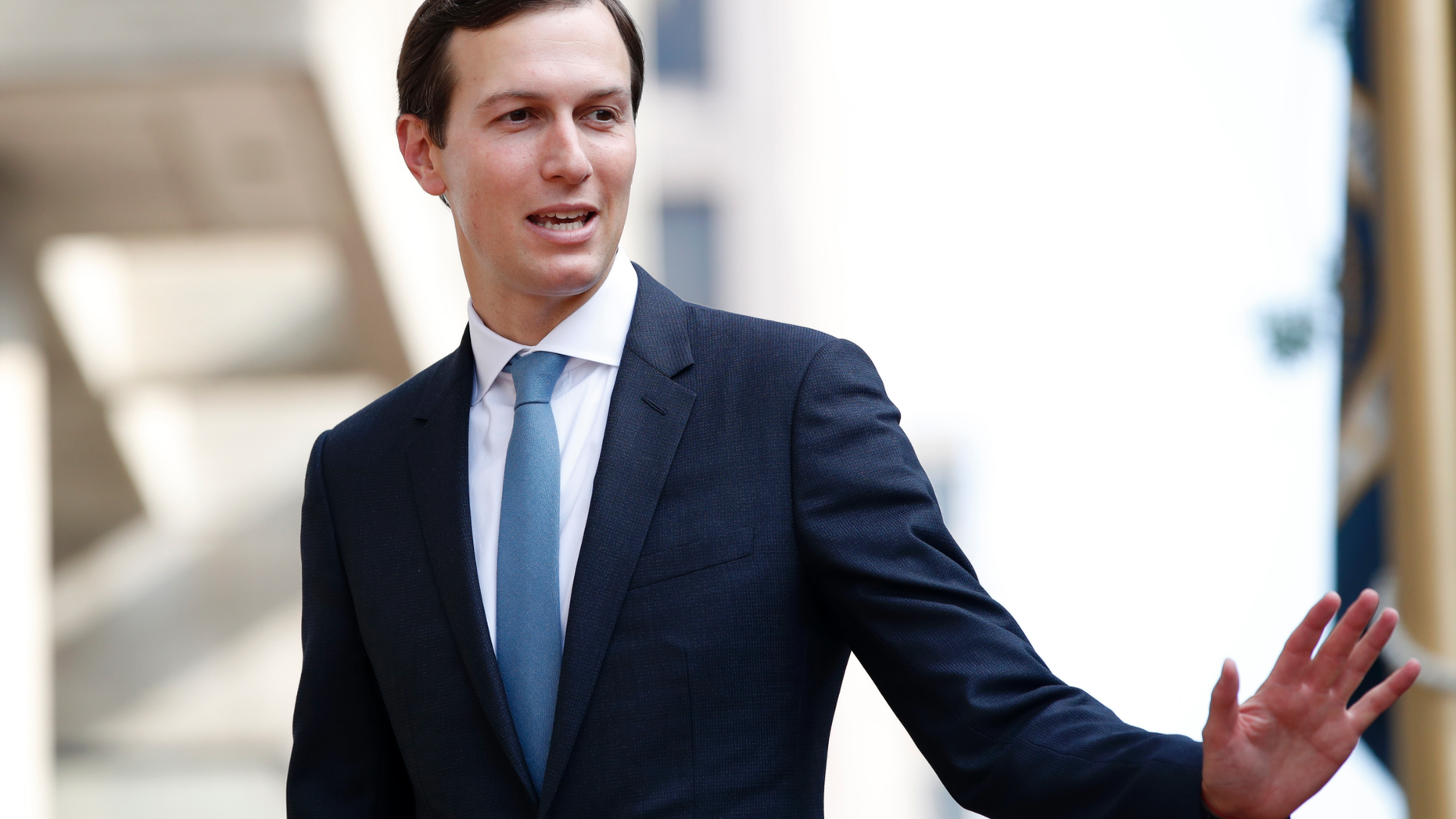 FILE - In this Aug. 29, 2018, photo, White House adviser Jared Kushner waves as he arrives at the Office of the United States Trade Representative for talks on trade with Canada, in Washington. (AP Photo/Jacquelyn Martin, File)
