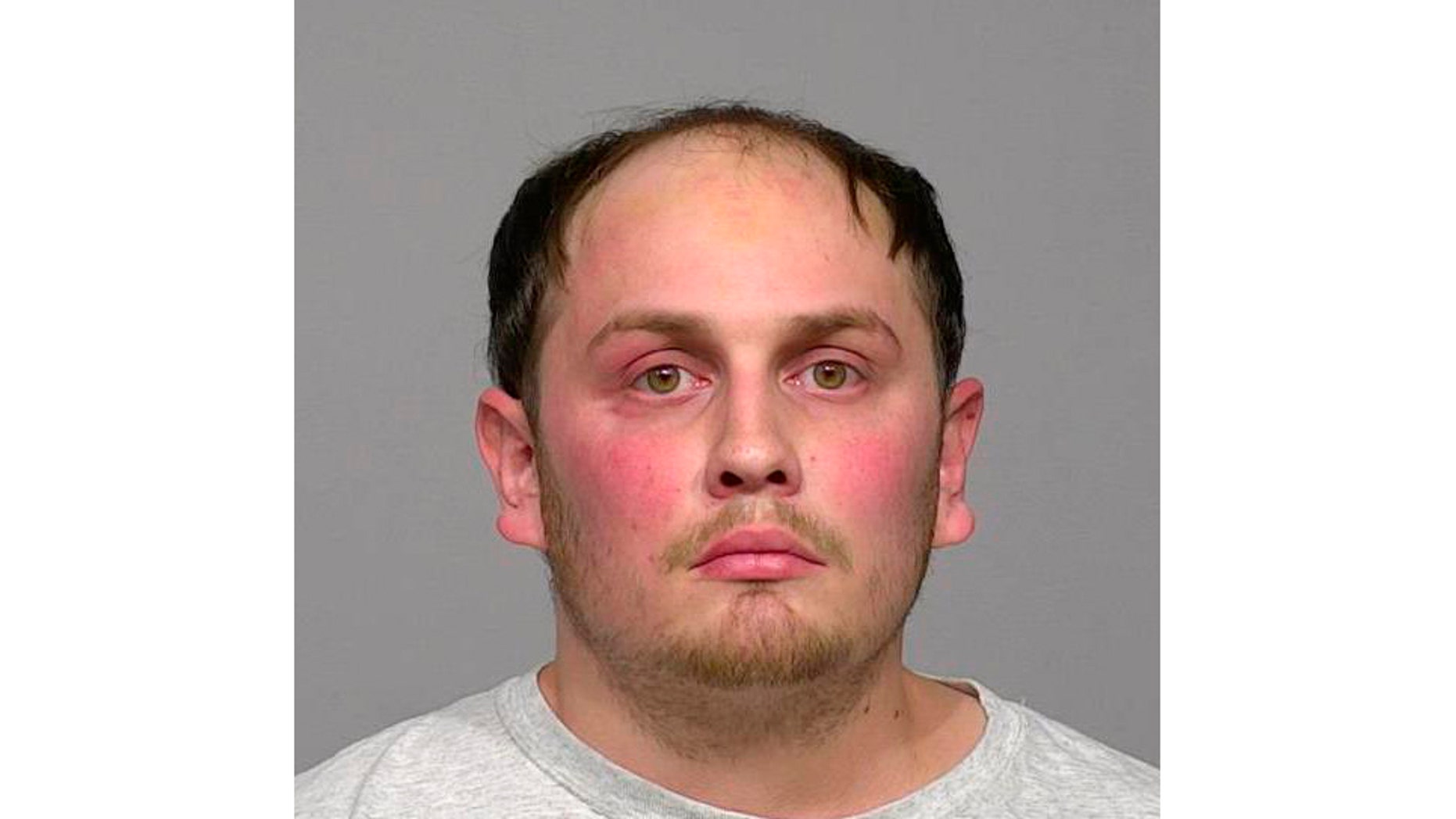   This undated image provided by Milwaukee County Jail shows Jordan Fricke. On Sunday, February 10, 2019, Fricke was charged with first degree intentional homicide and other crimes as part of the fatal shooting on Wednesday of Agent Matthew Rittner, who was serving a search warrant. (Milwaukee County Prison via AP) 