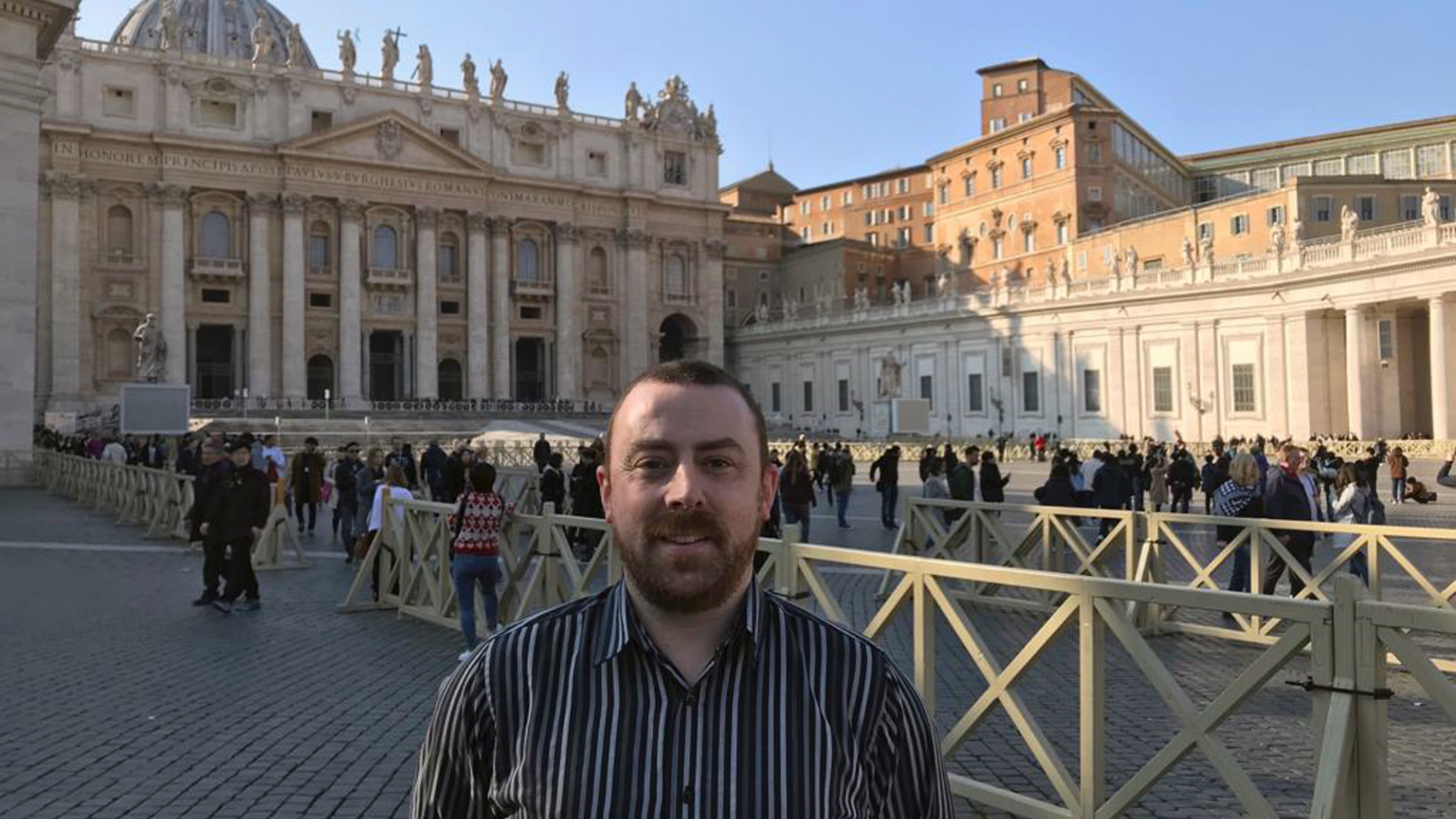 Vincent Doyle, of advocacy group Coping International, poses for a photo during an interview with The Associated Press, in St. Peter's Square at the Vatican, Wednesday, Feb. 20, 2019. The lead organizer of the Vatican's sex abuse summit Archbishop Charles Scicluna met with Doyle, the child of a priest and campaigner seeking to draw attention to another, related issue the Vatican has long sought to keep quiet: the plight of children of priests. (AP Photo/Nicole Winfield)