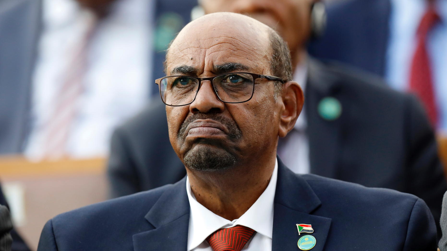 FILE - In this July 9, 2018, file photo, Sudan's President Omar al-Bashir attends a ceremony for Turkey's President Recep Tayyip Erdogan, at the Presidential Palace in Ankara, Turkey. Sudan's President has declared a state of emergency on Friday, Feb. 22, 2019, for a year and disbanded the government amid deadly protests. Al-Bashir — who seized power in a 1989 coup— also said Friday that for now he will not change the constitution to allow himself to seek a third term in office. (AP Photo/Burhan Ozbilici, File)