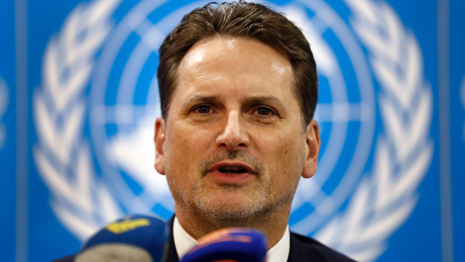 Pierre Krahenbuh, the head of the UN agency for Palestinian refugees, gives a press conference, in Beirut, Lebanon, Wednesday, Feb. 13, 2019. Krahenbuh said the organization was able to keep all schools and health centers in camps around Lebanon last year despite funding cuts. (AP Photo/Hussein Malla)