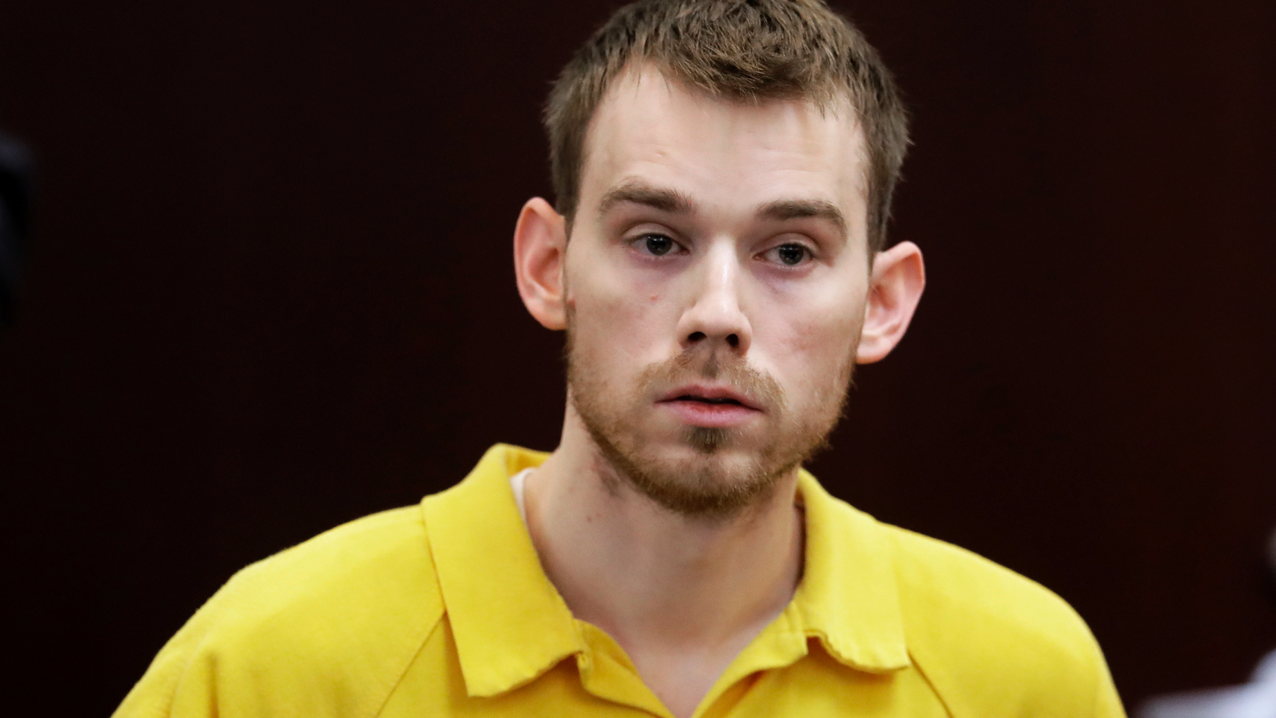 FILE - In this Aug. 22, 2018, file photo, Travis Reinking appears at a hearing in Nashville, Tenn. Reinking, accused of killing four people at a Tennessee Waffle House, has finally pleaded not guilty, nearly 10 months after his arrest. He has been held without bond since the attack last April 22. Reinking did not appear at his arraignment in Nashville on Wednesday, Feb. 13, 2019, where his lawyer entered the plea. (AP Photo/Mark Humphrey, File)