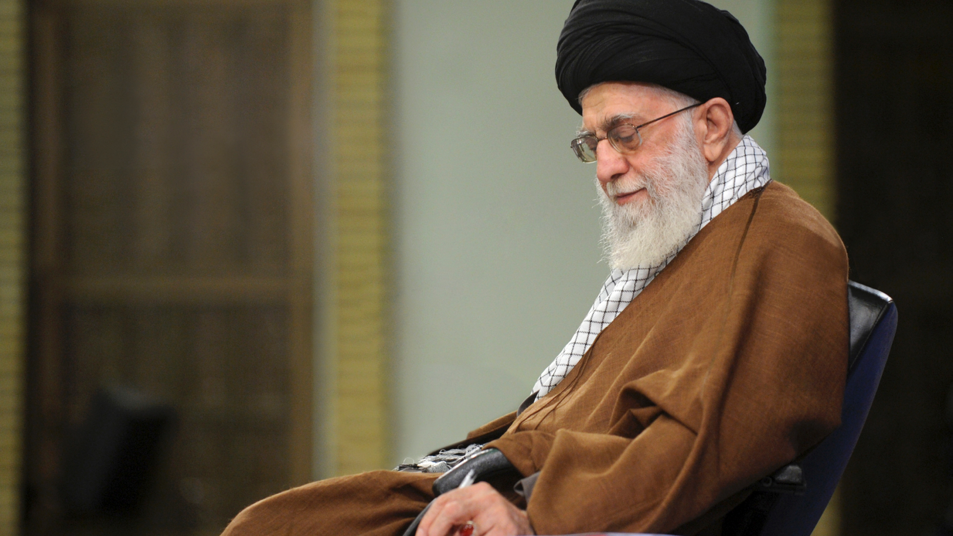 In this picture released on Jan. 12, 2019, by the official website of the office of the Iranian supreme leader, Supreme Leader Ayatollah Ali Khamenei takes notes during a meeting in Tehran, Iran. In a statement released on Wednesday Feb. 13, Iran's supreme leader said negotiations with the U.S. "will bring nothing but material and spiritual harm" — remarks that come ahead of an American-led meeting on the Mideast in Warsaw. (Office of the Iranian Supreme Leader via AP)