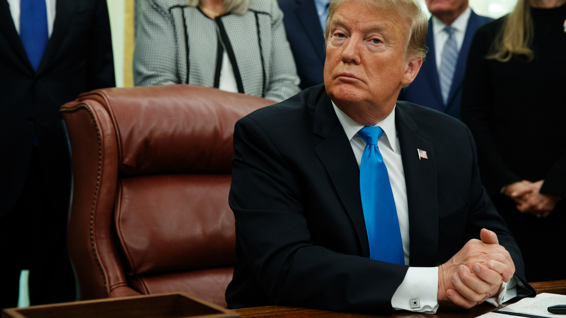 President Donald Trump pauses during a signing event for "Space Policy Directive 4" in the Oval Office of the White House, Tuesday, Feb. 19, 2019, in Washington. (AP Photo/ Evan Vucci)