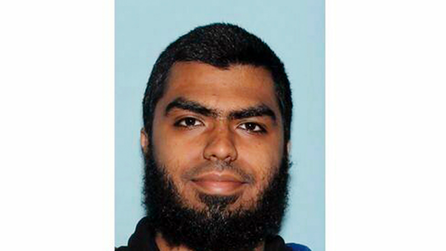 FILE - This undated file photo provided by the Maricopa County Sheriff's Office shows Ismail Hamed, who authorities say threw rocks at a sheriff's sergeant in metro Phoenix six weeks ago and wielded a knife toward the officer. A court record that authorities were forced to release this week alleges Hamed asked the sergeant to shoot him during the violent encounter. Hamed, who was shot by the sergeant, has pleaded not guilty to assault and terrorism charges. (Maricopa County Sheriff's Office via AP, File)