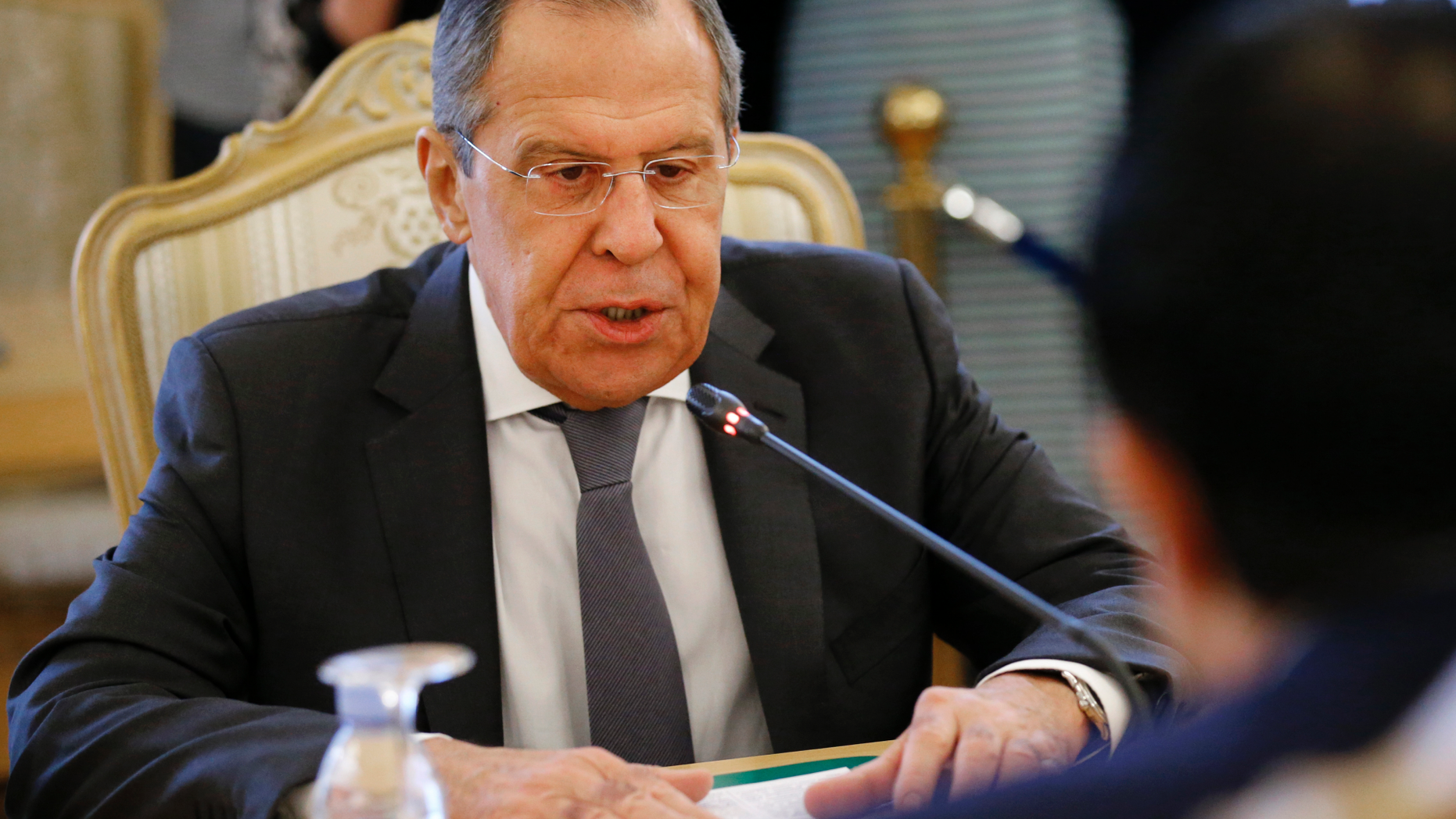 Russian Foreign Minister Sergey Lavrov speaks to Cypriot Foreign Minister Nikos Christodoulidis, right, during their meeting in Moscow, Russia, Friday, Feb. 22, 2019. (AP Photo/Alexander Zemlianichenko)