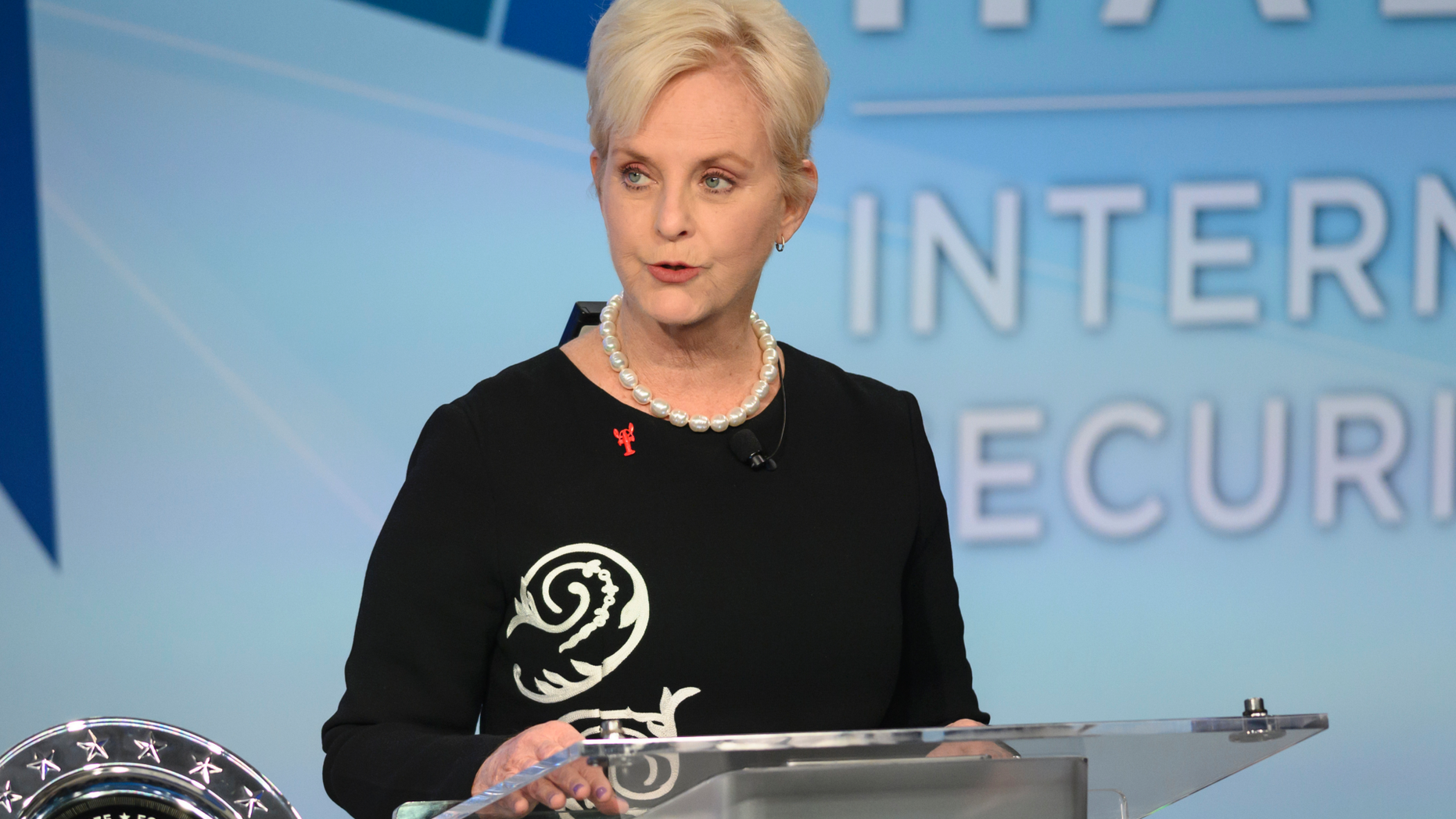 FILE - In this Nov. 17, 2018 file photo, Cindy McCain pauses while presenting the inaugural John McCain Prize for Leadership in Public Service to the People of the island of Lesbos, Greece at the Halifax International Security Forum in Halifax, Canada.