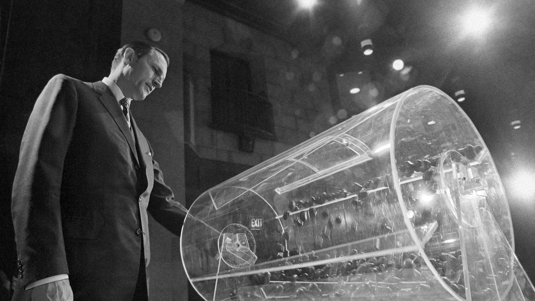 File - This file of February 2, 1972 shows the project director, Curtis W. Tarr, spinning one of the two plexiglass drums in Washington at the time of the launch of the fourth annual selective service lottery. The chairman of a group to review the changes to the US military project said Monday, February 25, 2019 that his recommendations to Congress would not be influenced by the recent decision of a federal judge that the current system is unconstitutional, because it only applies to men. The army has recruited no one in its service for more than 40 years, but American men still have to register at 18 years old. Recent efforts to make registration mandatory for women have also sparked intense debate in Washington. (AP Photo / Charles W. Harrity, File)