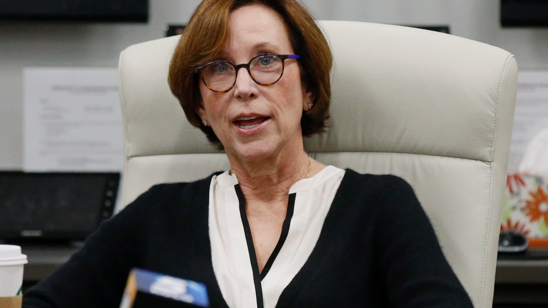 Chair of the University of Oklahoma Board of Regents, Dr. Leslie Rainbolt-Forbes announces that the Board of Regents will go into executive session during a special meeting in Oklahoma City, Wednesday, Feb. 20, 2019. (AP Photo/Sue Ogrocki)
