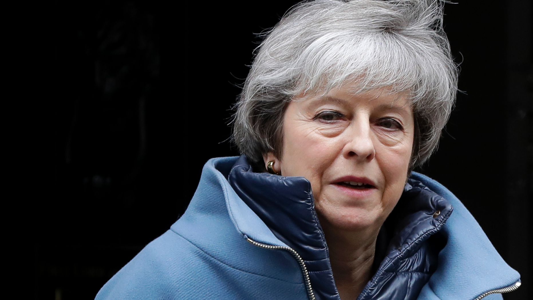 Britain's Prime Minister Theresa May leaves 10 Downing Street in London, Tuesday, Feb. 12, 2019. May is expected to address Parliament on Brexit later Tuesday, followed by a debate. (AP Photo/Kirsty Wigglesworth)