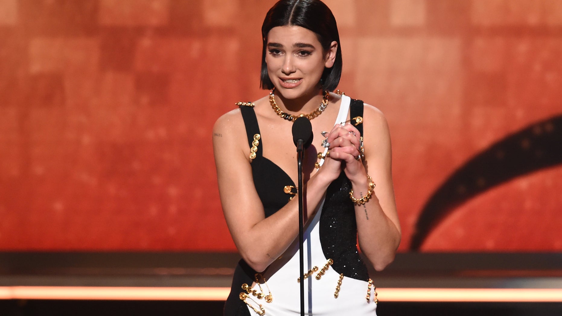 Dua Lipa, who won the Grammy for Best New Artist on Sunday, spoke to reporters backstage about Ariana Grande and 21 Savage.