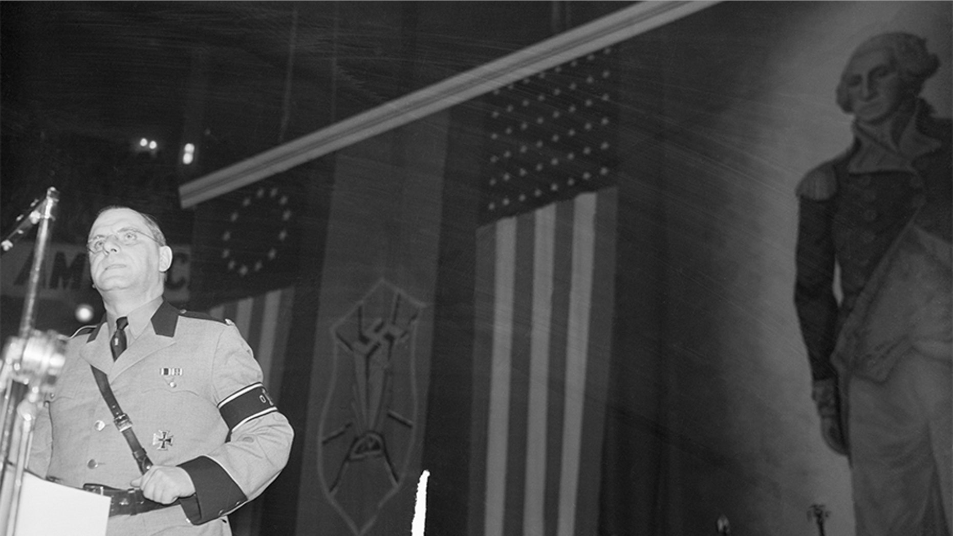 Fritz Kuhn, local Fuehrer, leader of the German American Bund, addresses the Bund's heavily guarded "Americanization" rally at Madison Square Garden.